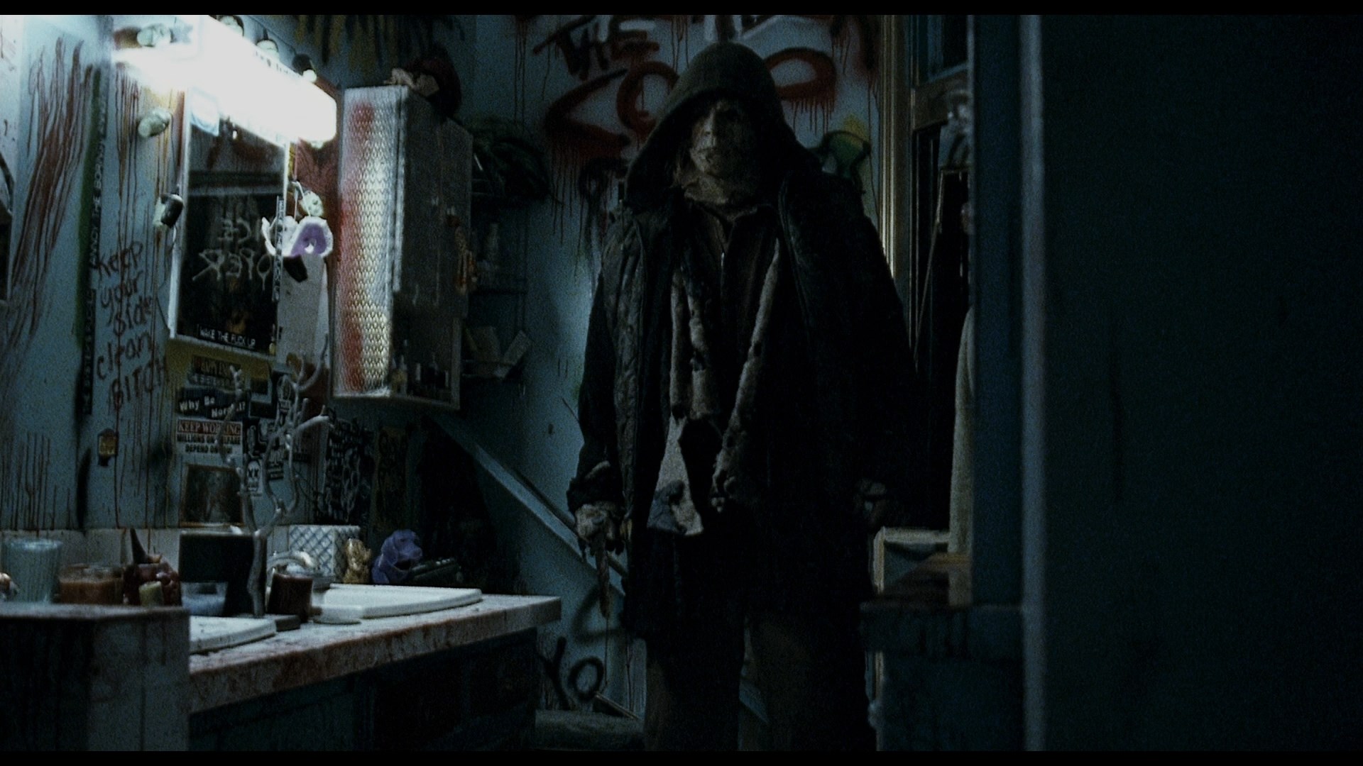Michael Myers from Halloween in a dark, graffiti-covered room HD Wallpaper