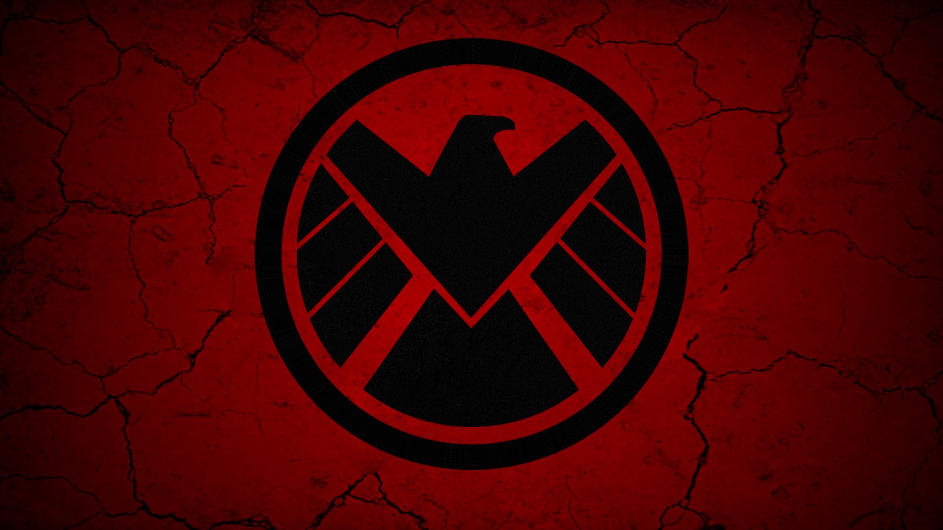 S.H.I.E.L.D. logo on cracked red background HD Wallpaper