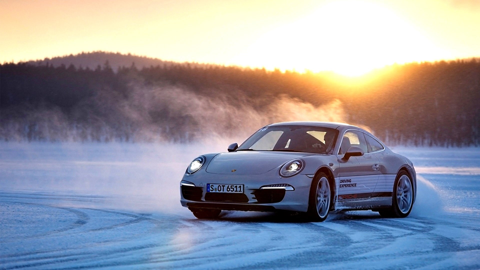 Porsche 911 Turbo driving on ice during sunset HD Wallpaper