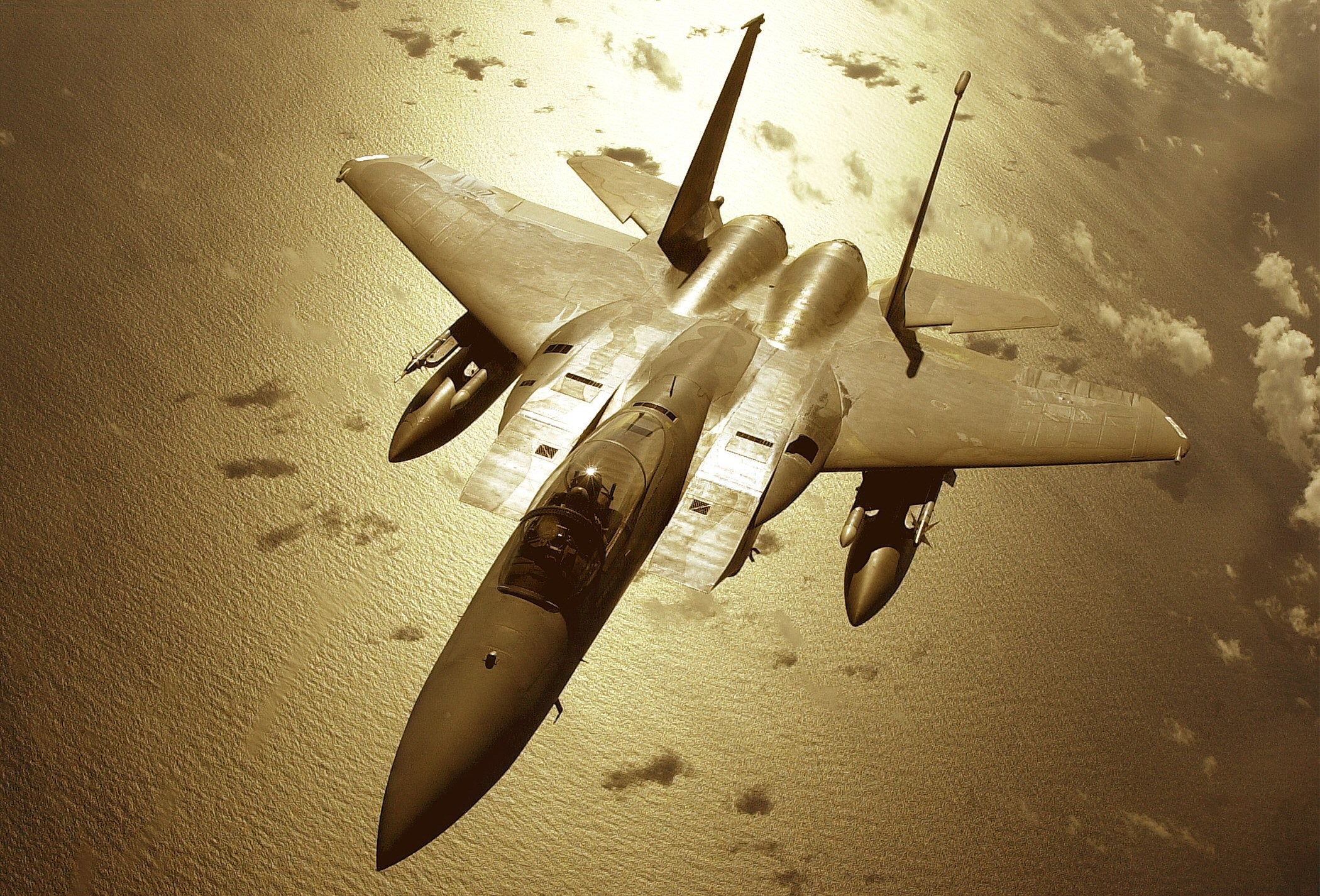 McDonnell Douglas F-15 Eagle flying over the ocean HD Wallpaper