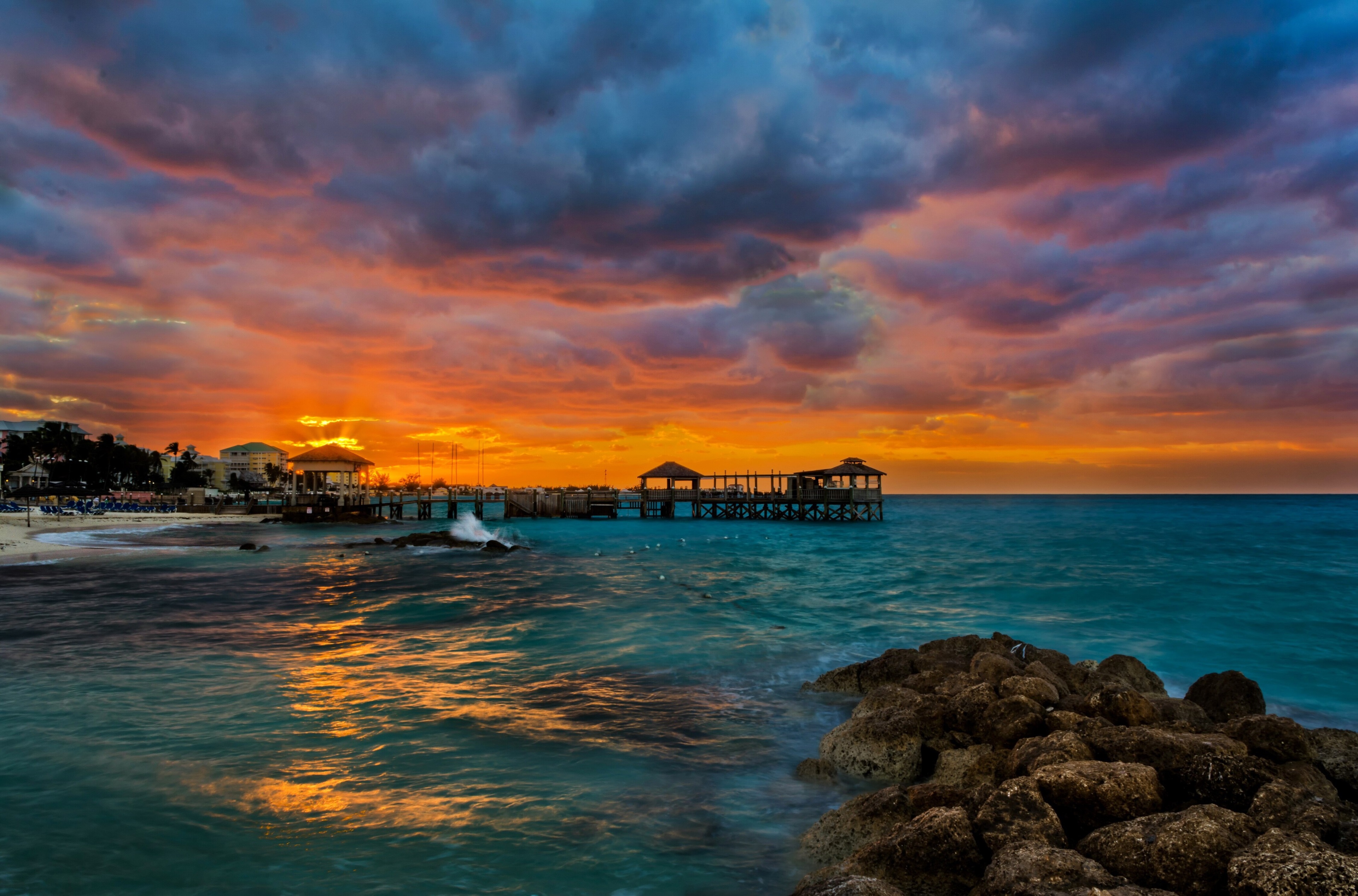 Stunning 4K Sunset Over Ocean Pier HD Wallpaper