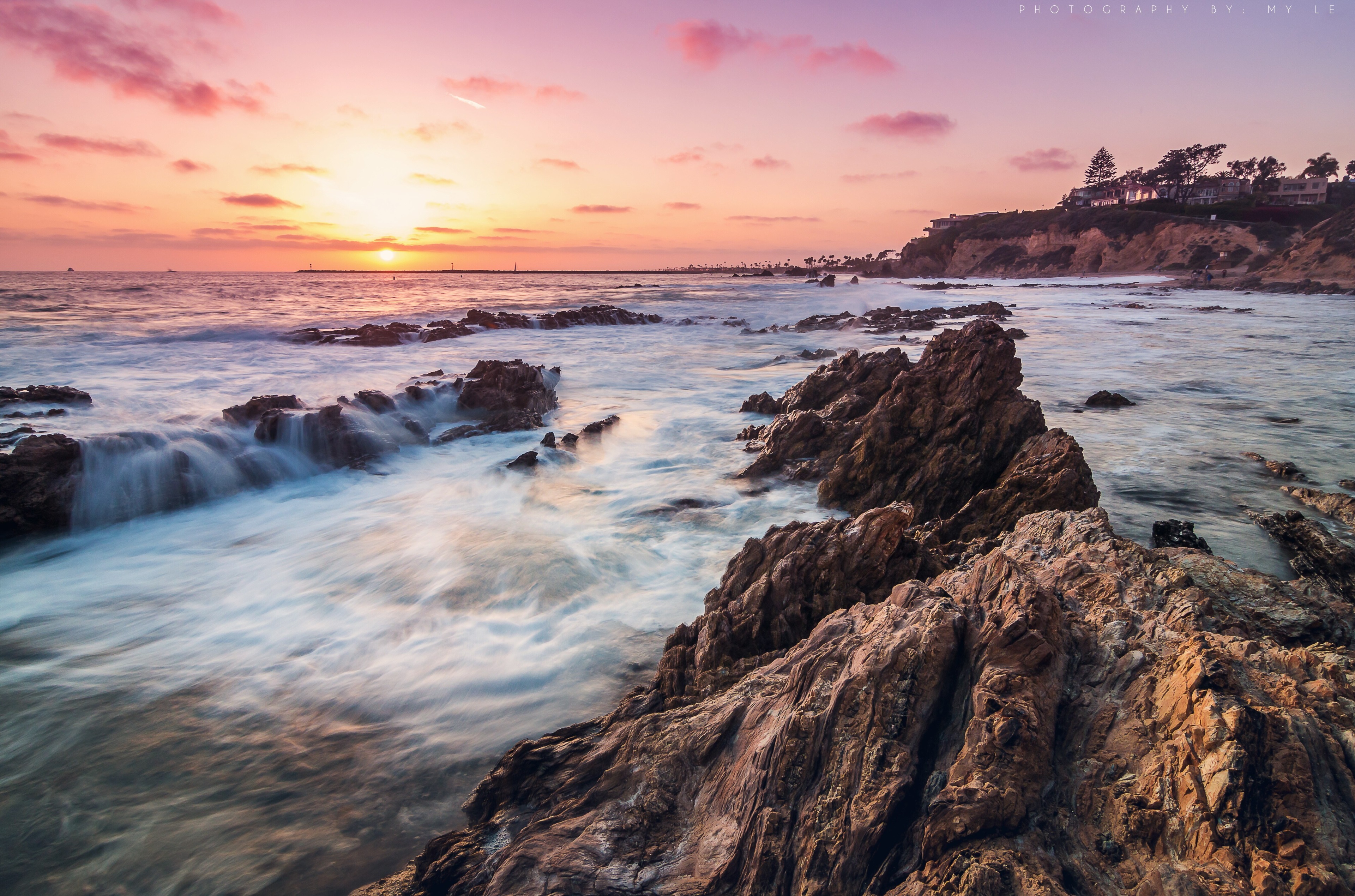 Sunset over Corona Del Mar rocky coast 4K HD Wallpaper