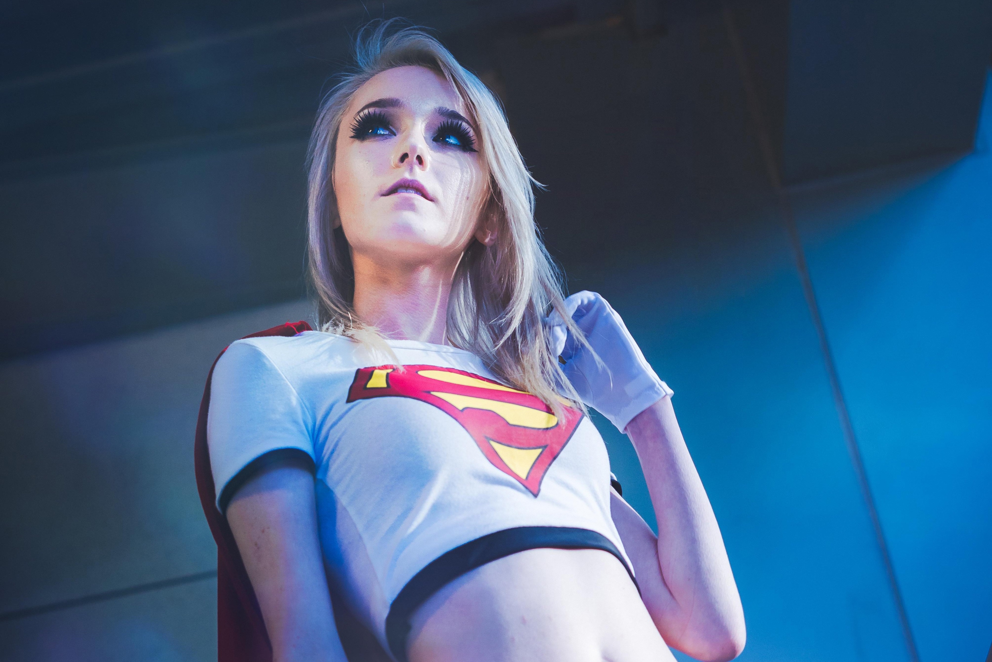 4K Cosplay of Supergirl in Dramatic Lighting HD Wallpaper