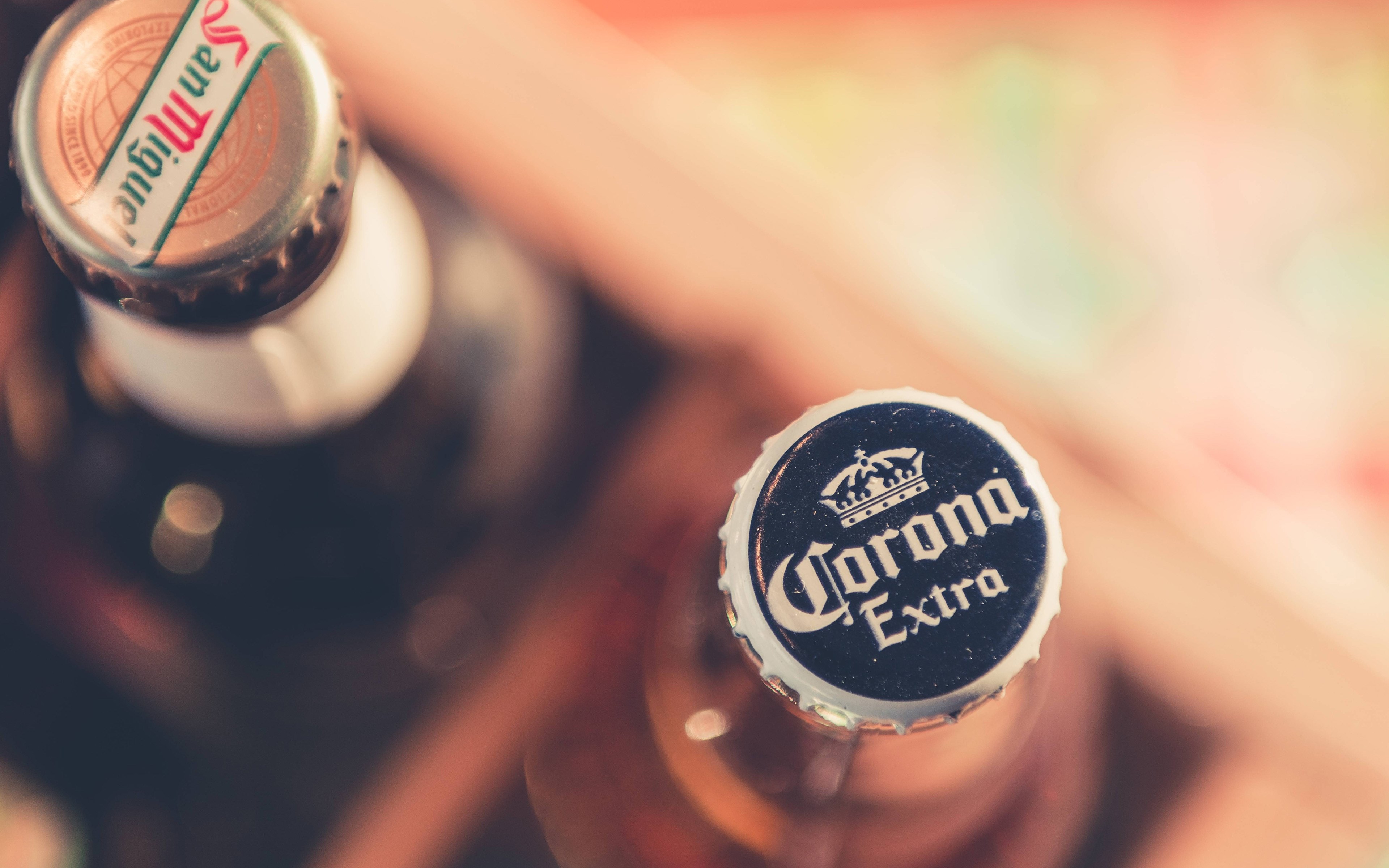 Corona Extra and San Miguel beer bottles HD Wallpaper