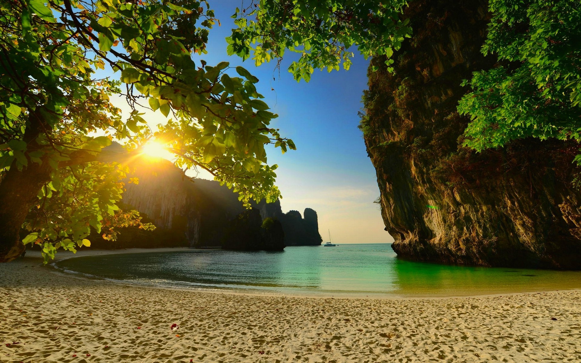 Tropical beach with limestone cliffs and sunset in Thailand HD Wallpaper