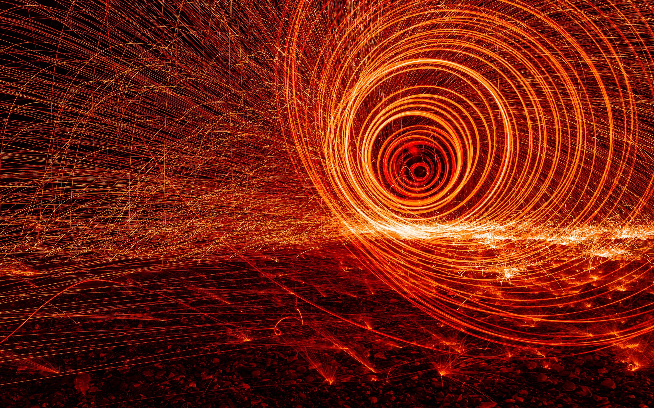 Abstract spiral vortex of light painting sparks HD Wallpaper
