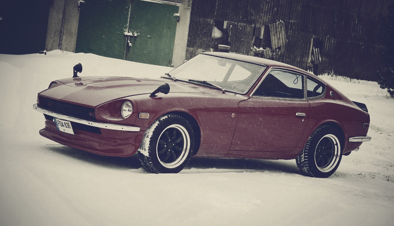 Red Datsun 240Z parked in snow HD Wallpaper