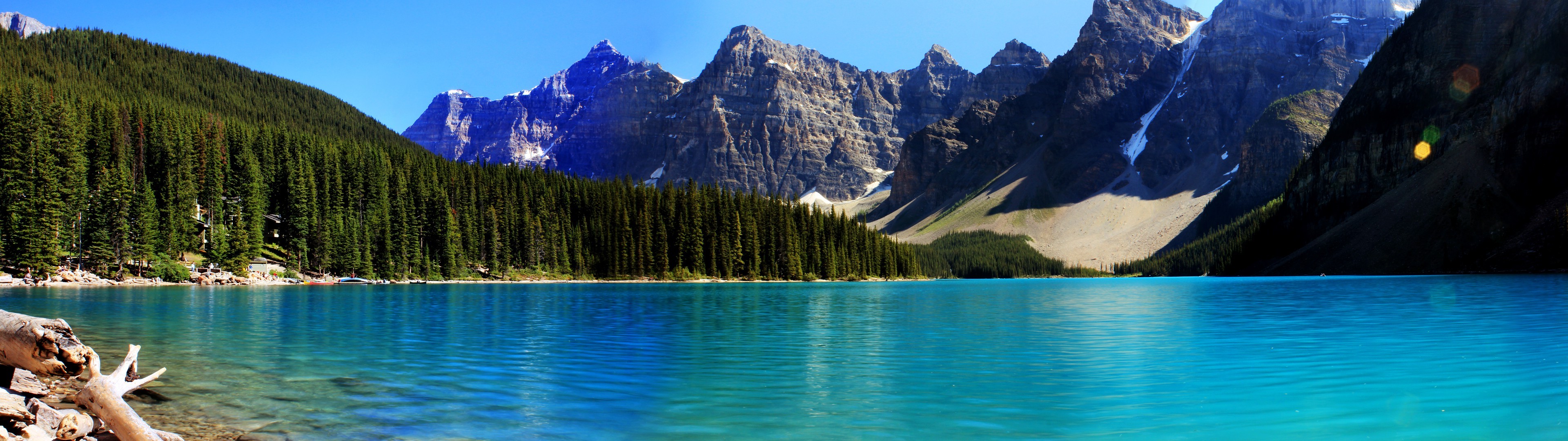 Turquoise lake and mountains with pine forest HD Wallpaper