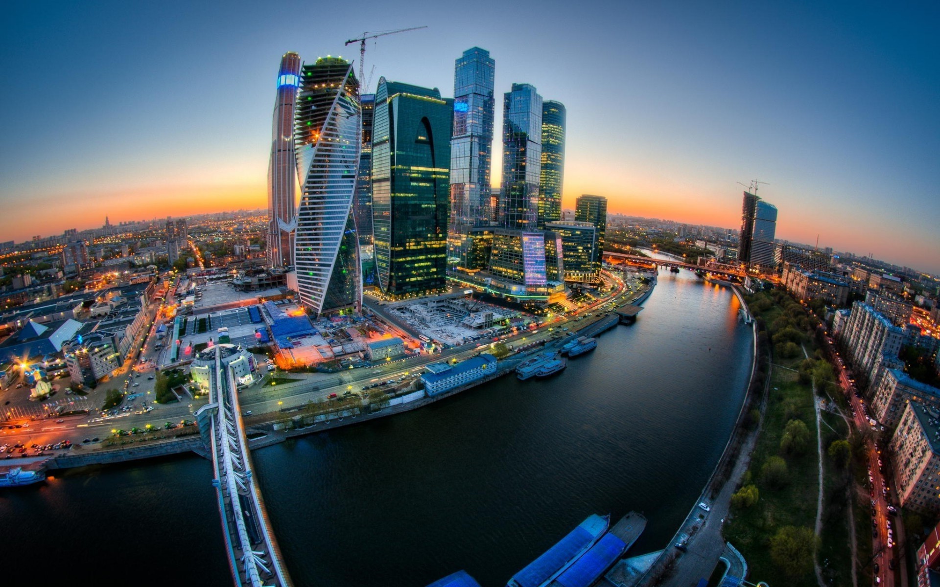 Moscow cityscape with skyscrapers and river at sunset HD Wallpaper