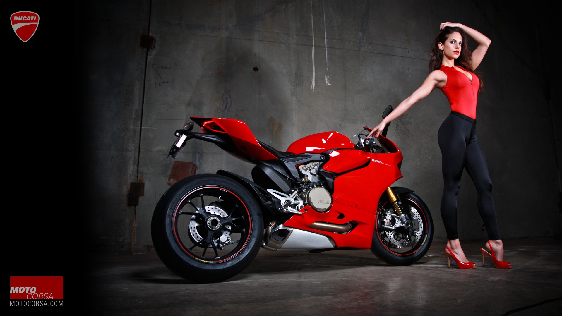 Woman in red bodysuit and black leggings with Ducati motorcycle HD Wallpaper