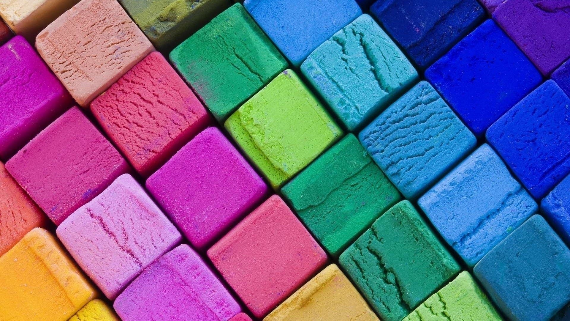 Colorful pastel chalks arranged diagonally HD Wallpaper