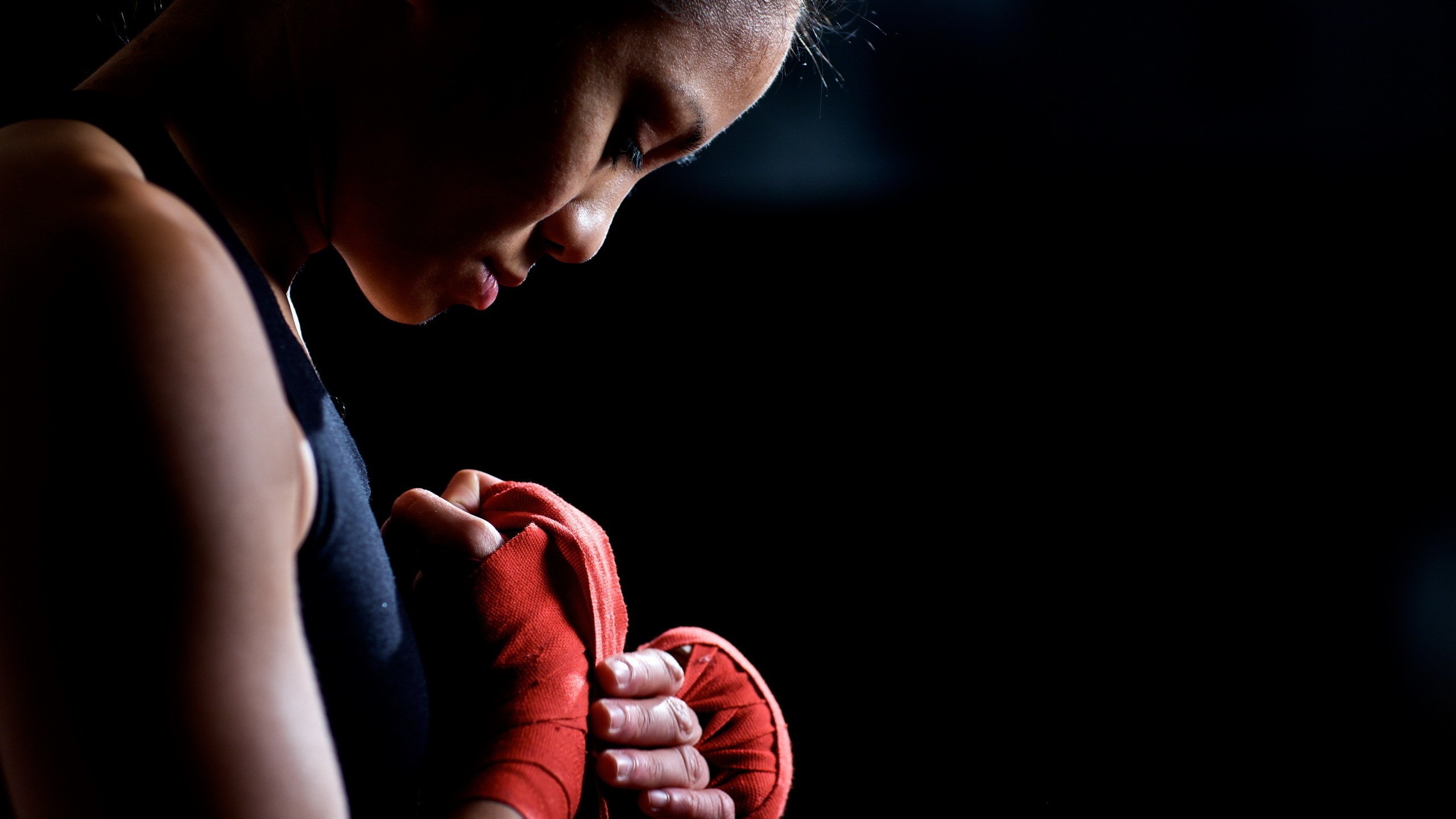 Woman wrapping hands for boxing HD Wallpaper