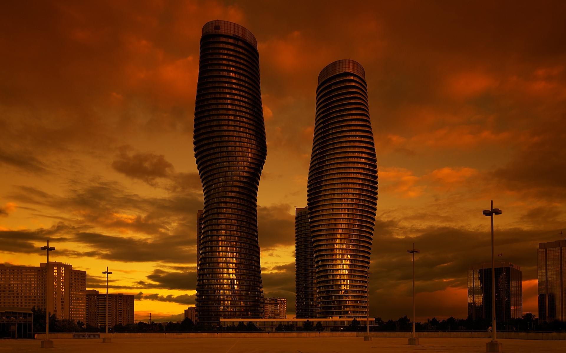 Two twisting skyscrapers at sunset in Mississauga, Canada HD Wallpaper