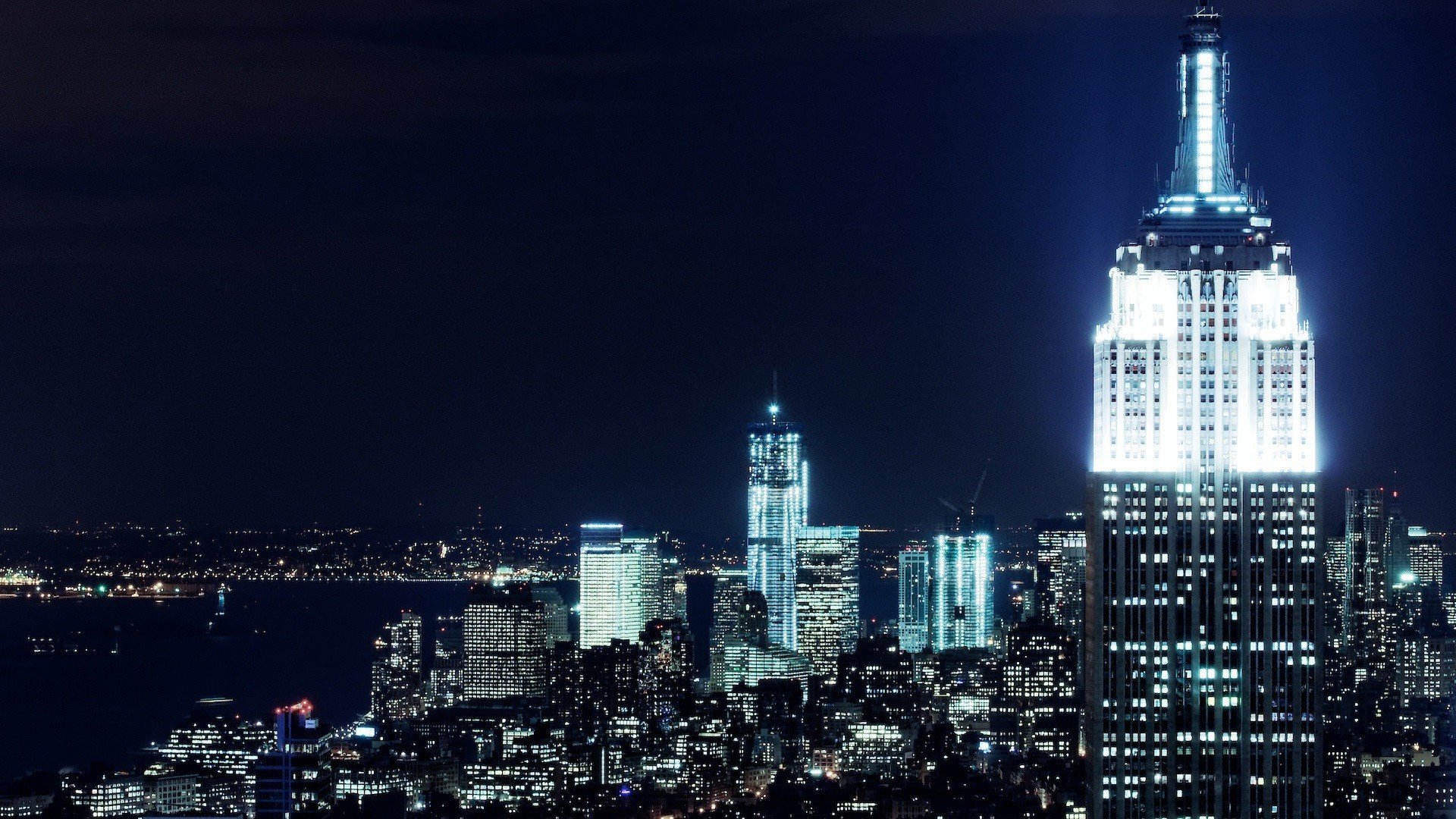 New York City skyline at night with Empire State Building HD Wallpaper