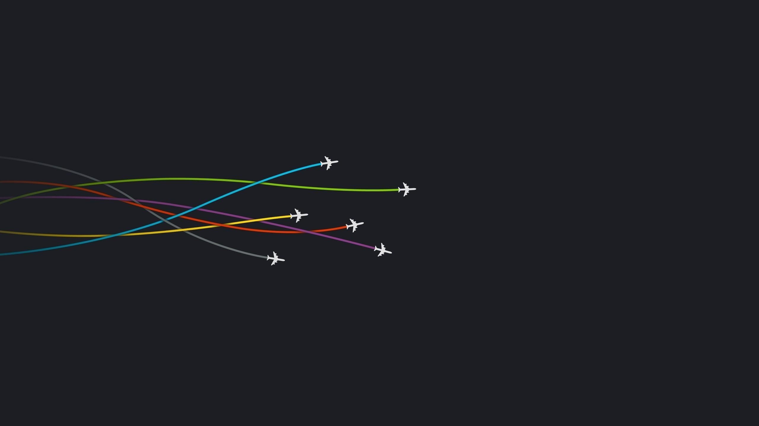 Minimalist airplanes with colorful trails on dark background HD Wallpaper