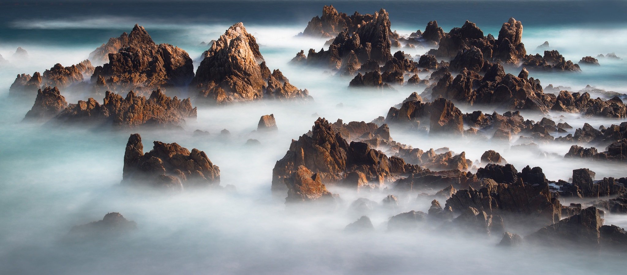 Rocky coast with fog in South Korea HD Wallpaper
