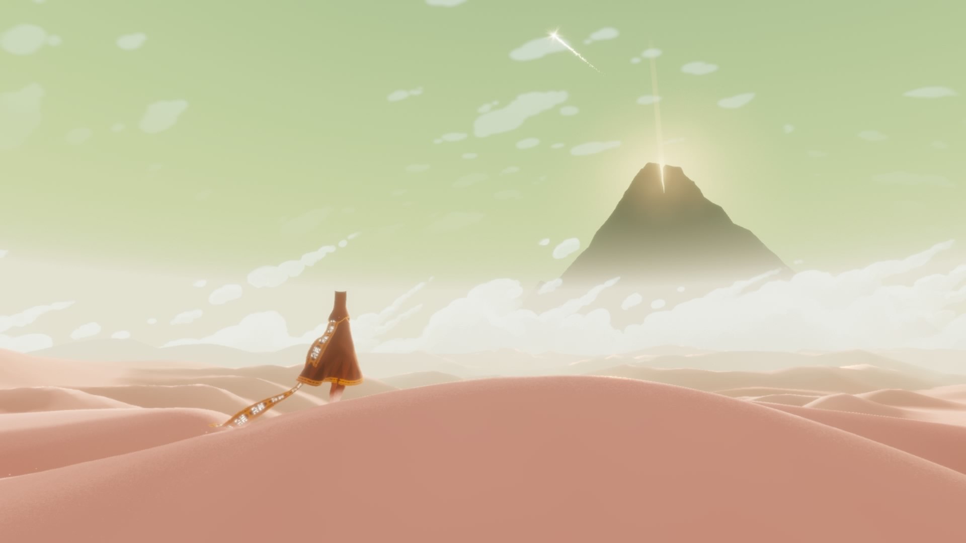 Journey video game character walking through desert towards mountain HD Wallpaper