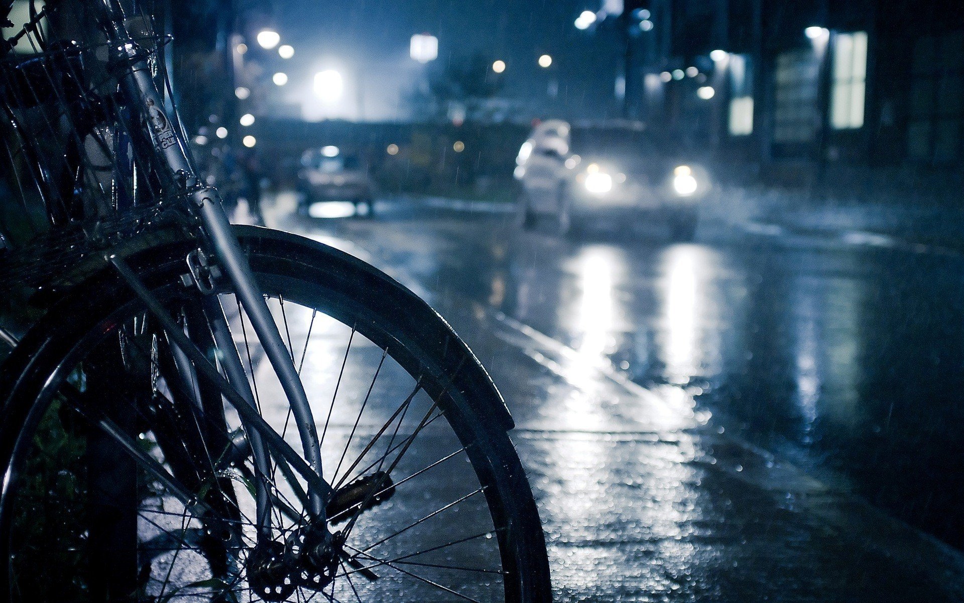 Bicycle on a Rainy City Street at Night HD Wallpaper