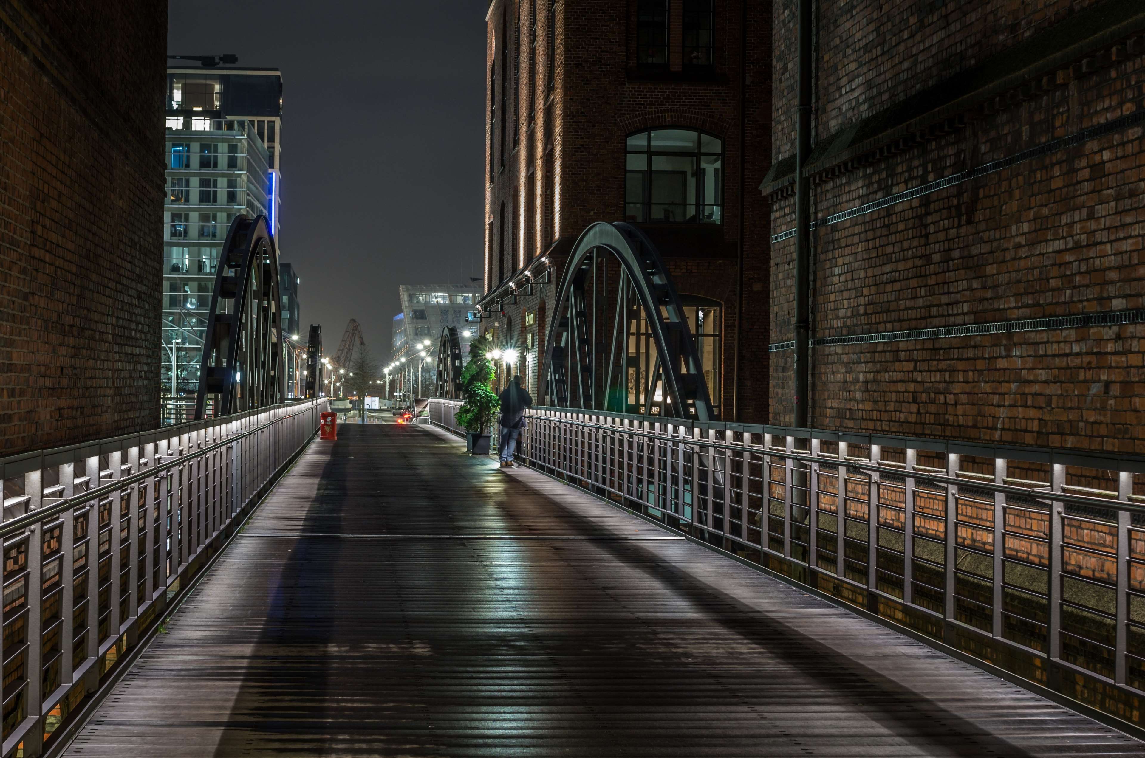 Bridge at Night with Brick Buildings and Modern Architecture HD Wallpaper