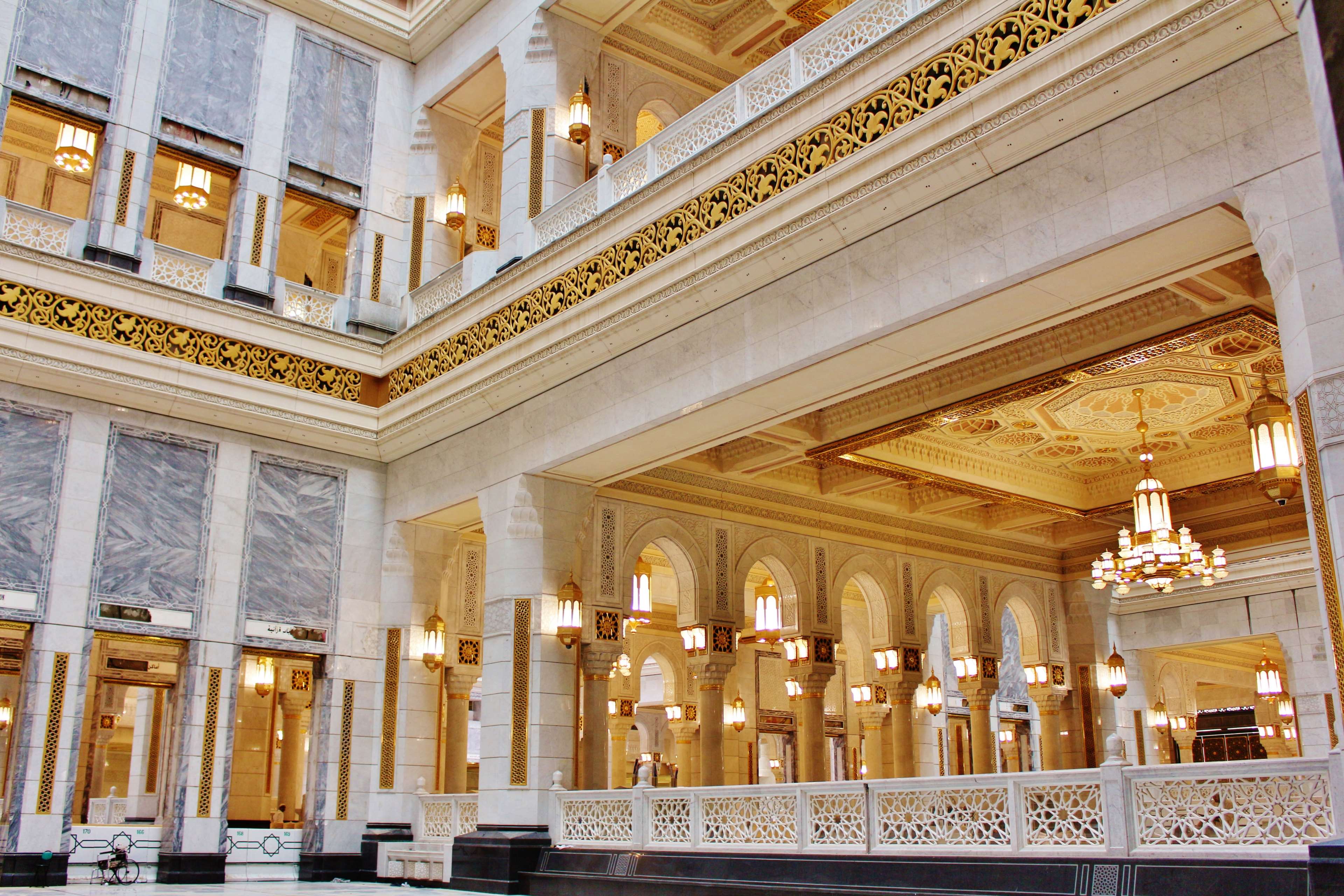 Interior of a luxurious building with marble and gold accents HD Wallpaper