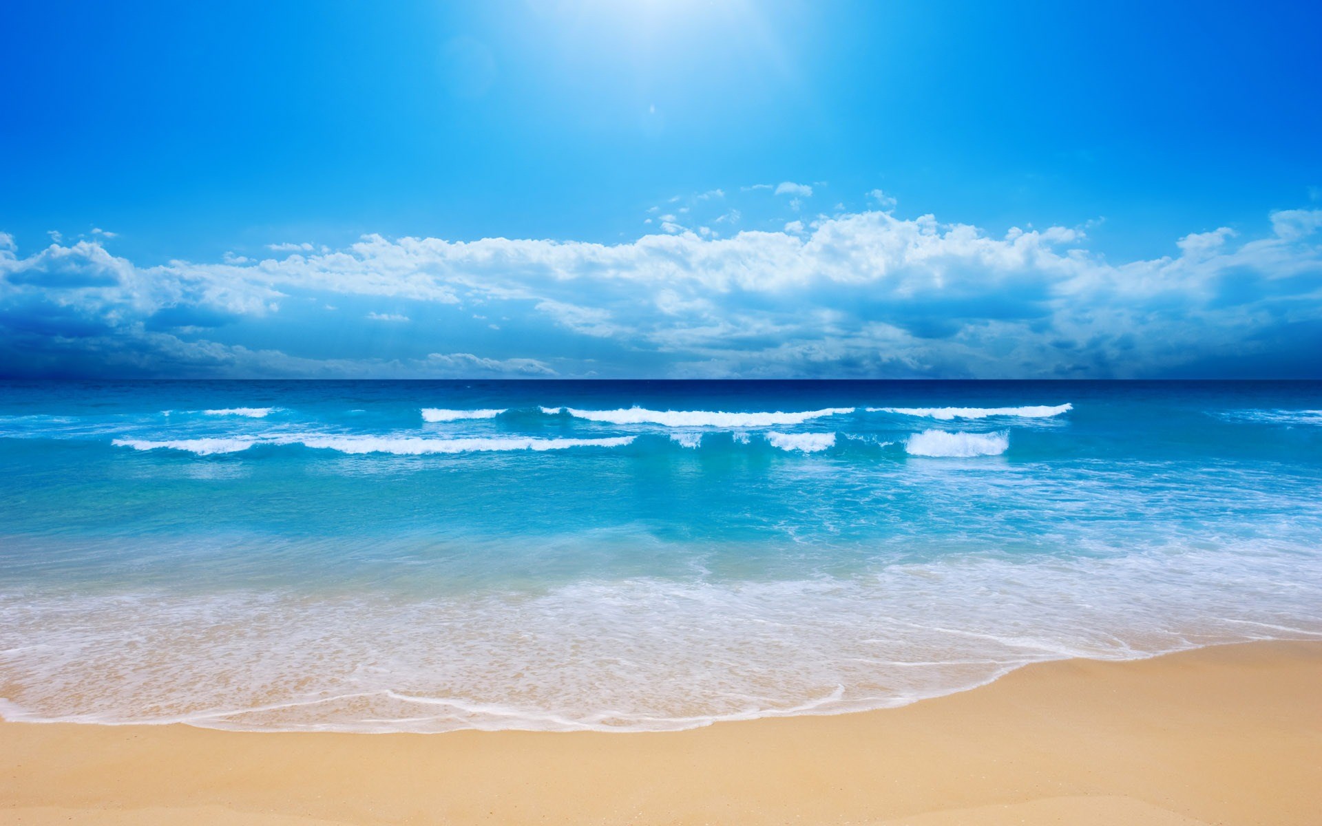 Beach with waves and blue sky HD Wallpaper
