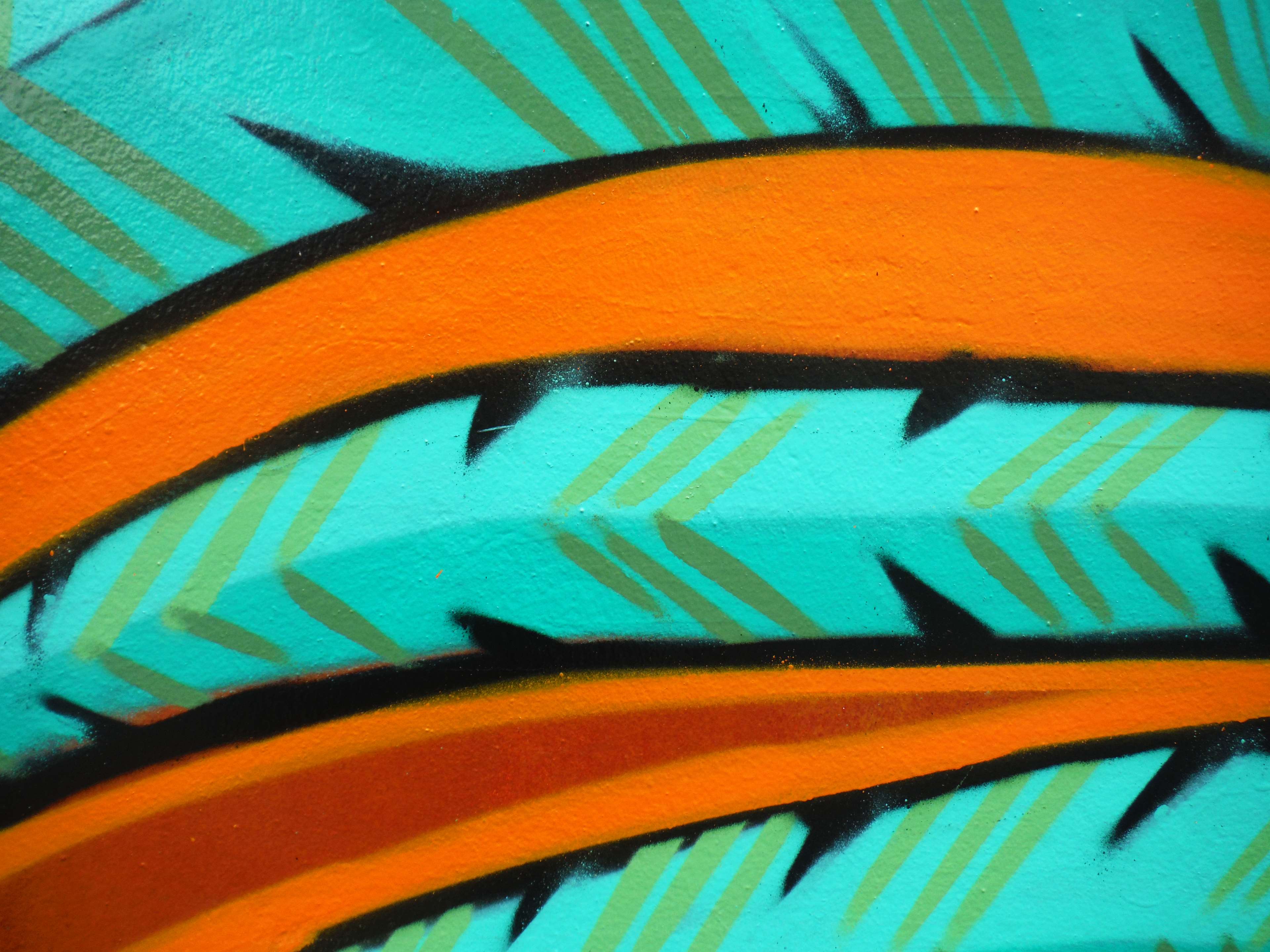 Abstract Graffiti Art with Orange Stripes and Teal Background 4K HD Wallpaper