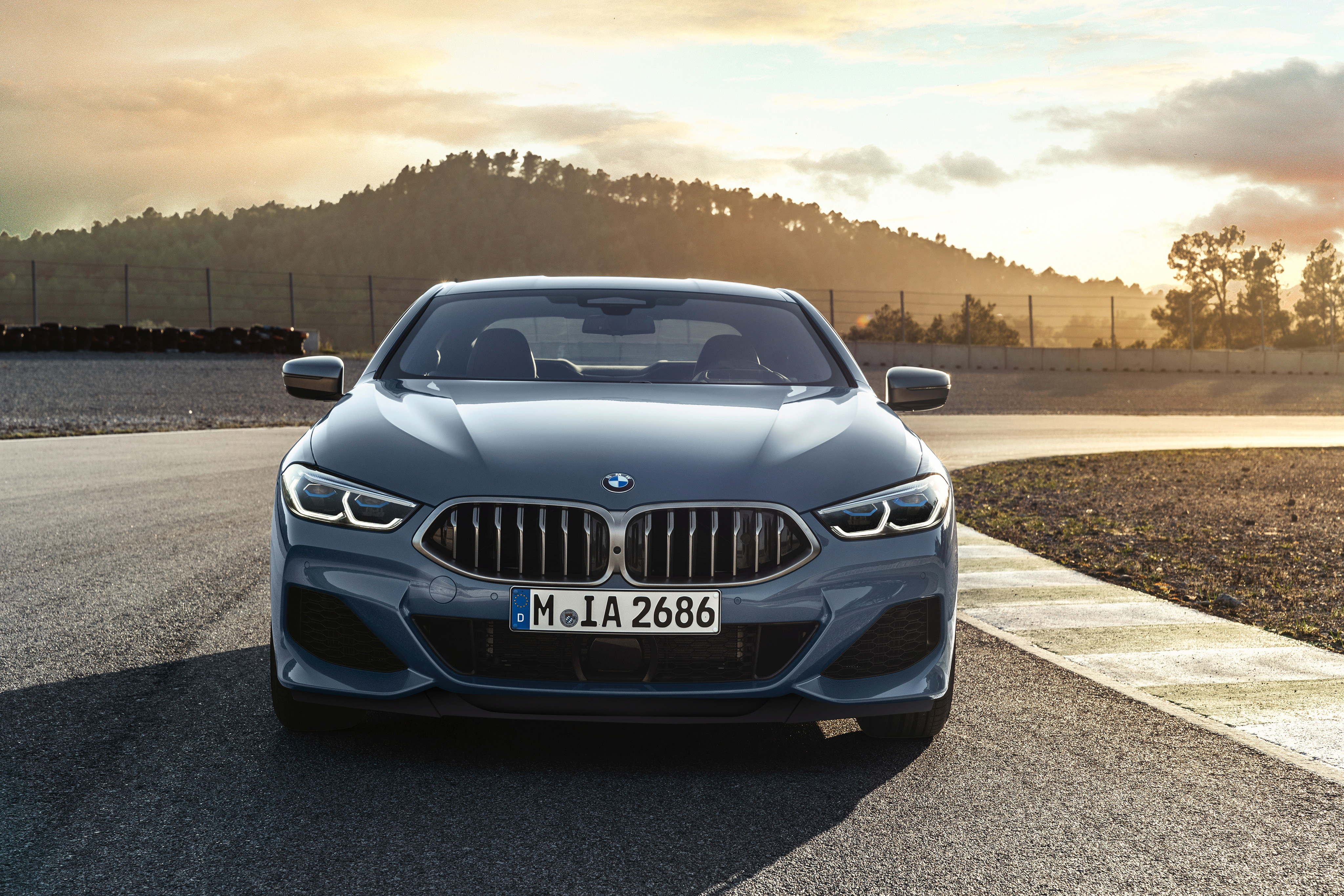 BMW 8 Series Coupe on a Racetrack HD Wallpaper