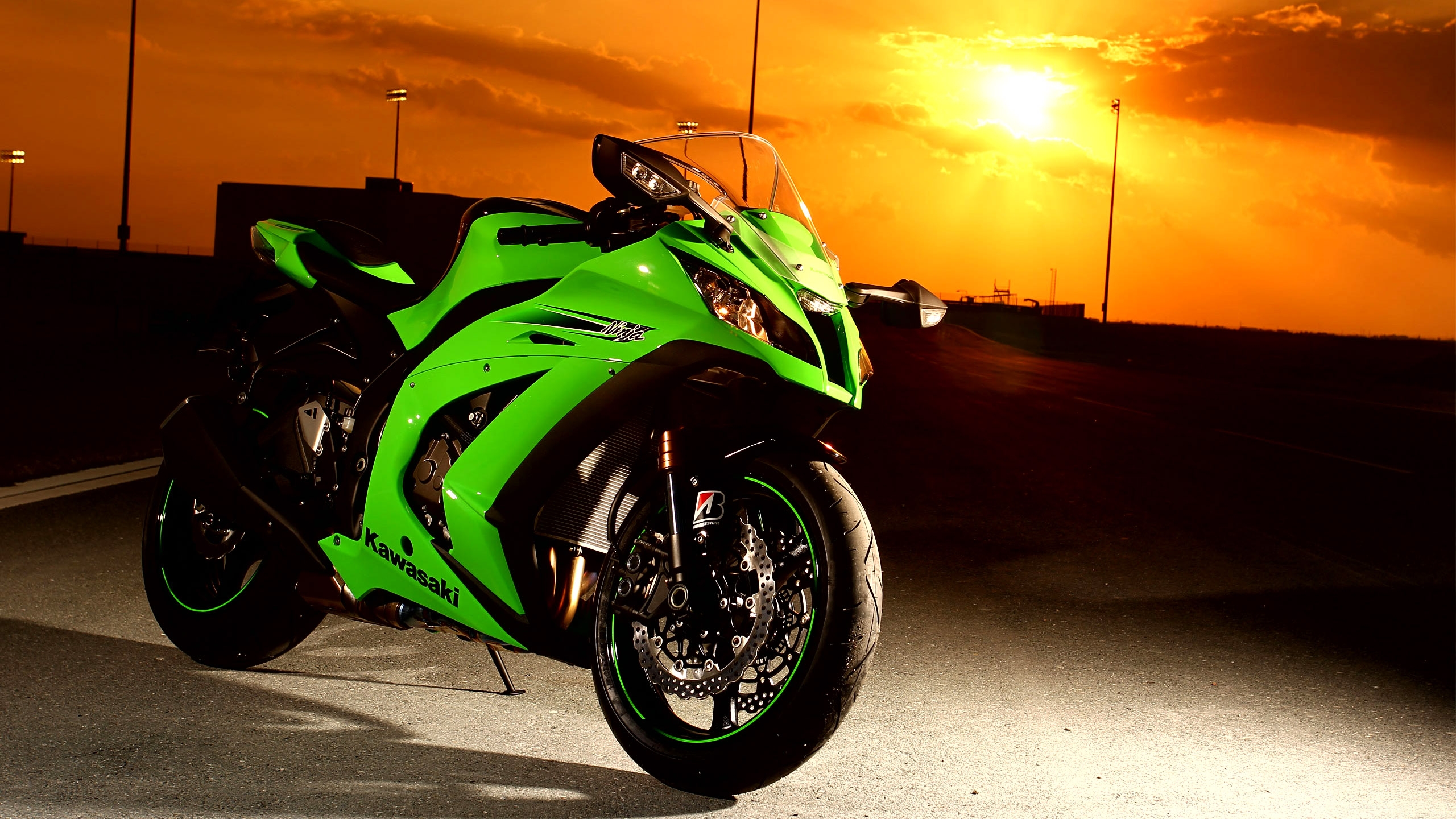 Green Kawasaki Ninja Motorcycle at Sunset HD Wallpaper
