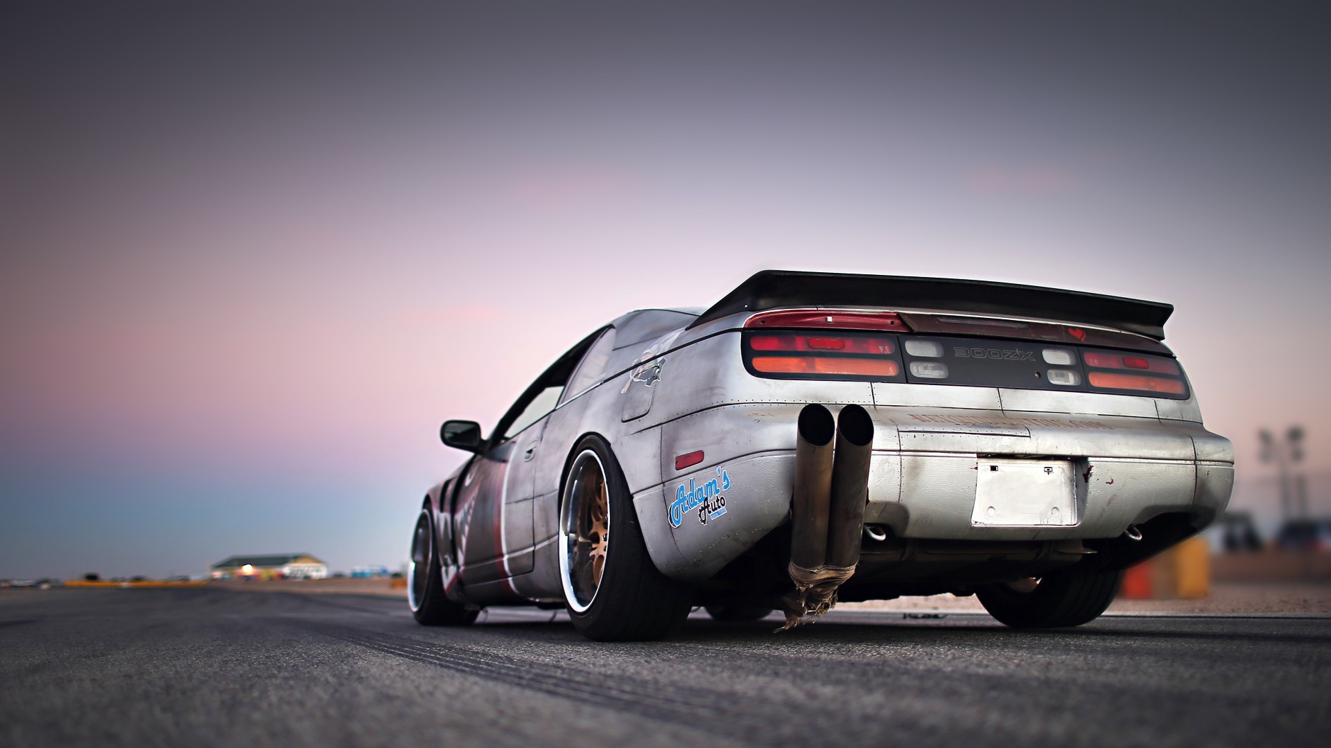 Nissan 300ZX drift car with large exhaust pipes HD Wallpaper