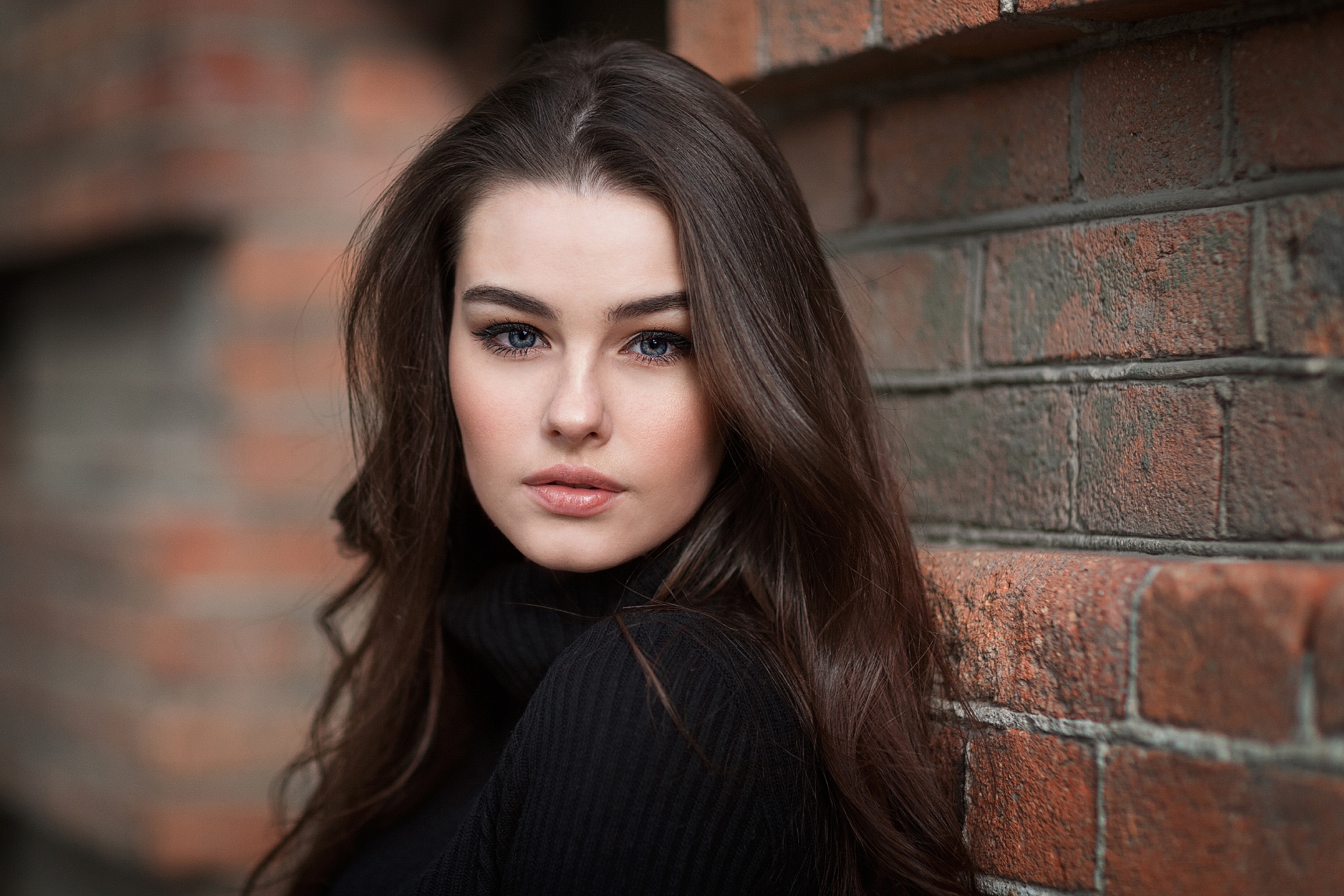Woman with long brown hair and blue eyes HD Wallpaper