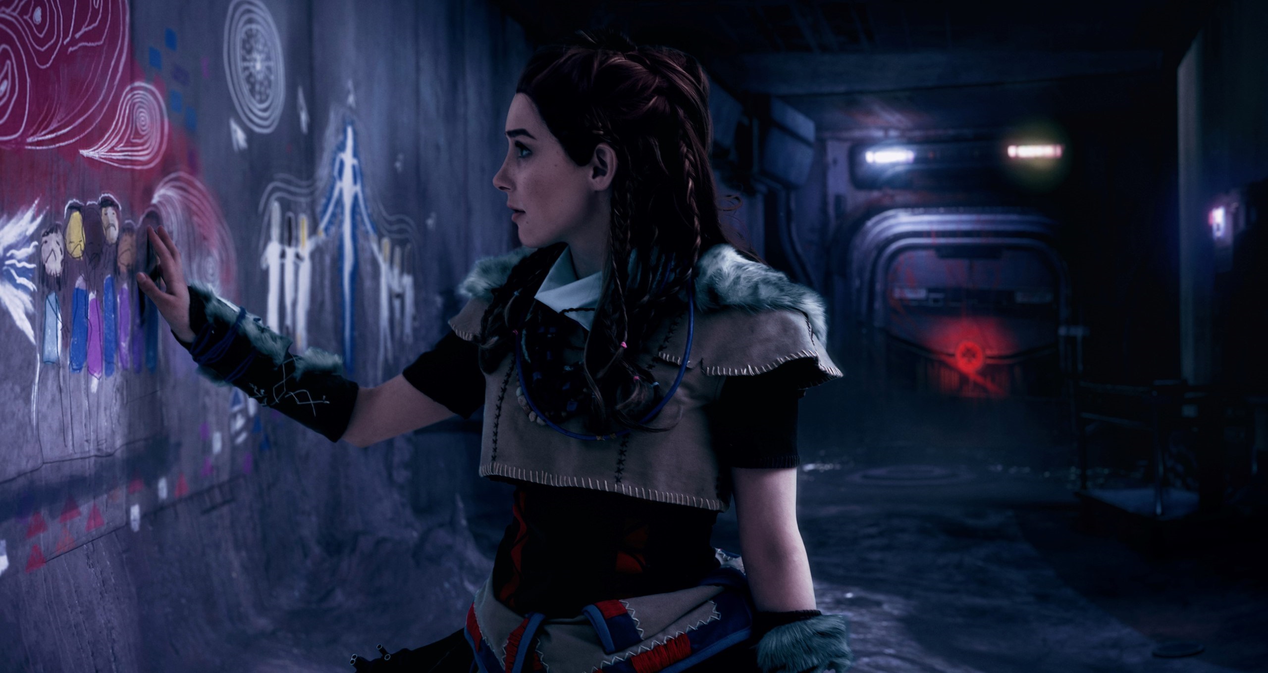 Aloy from Horizon Zero Dawn touching a mural HD Wallpaper