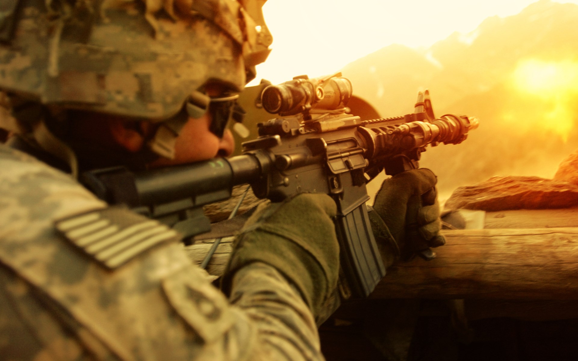 US Army soldier aiming rifle in a desert landscape HD Wallpaper