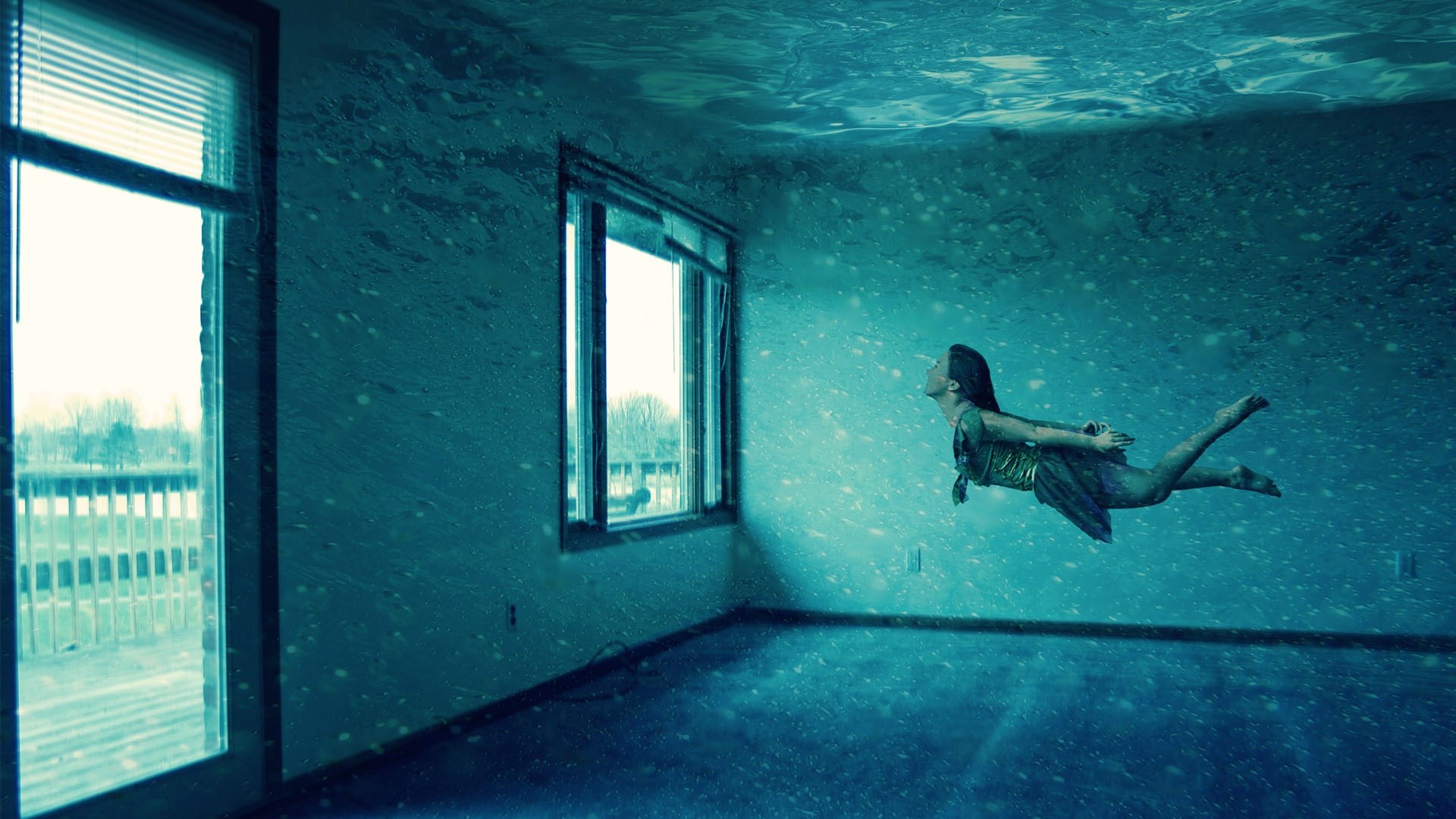 Woman swimming in flooded room HD Wallpaper