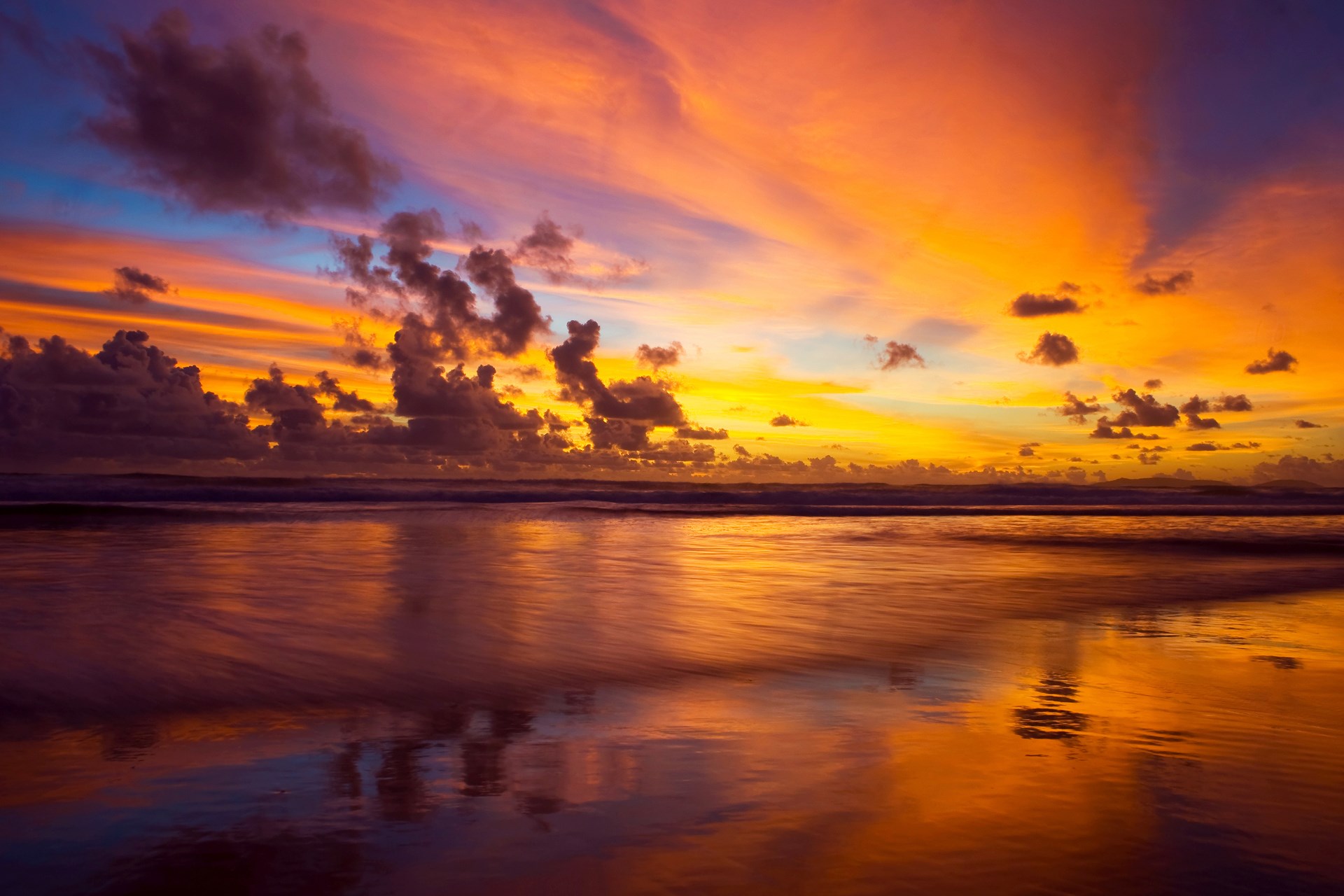 Sunset over the ocean with colorful clouds HD Wallpaper