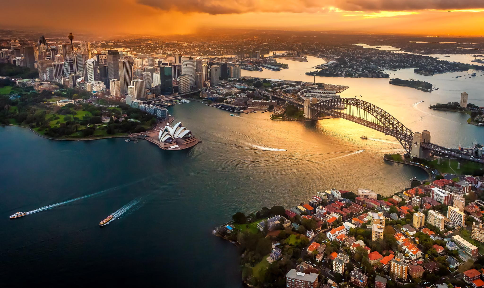Sydney Harbour at sunset with Opera House and Harbour Bridge HD Wallpaper