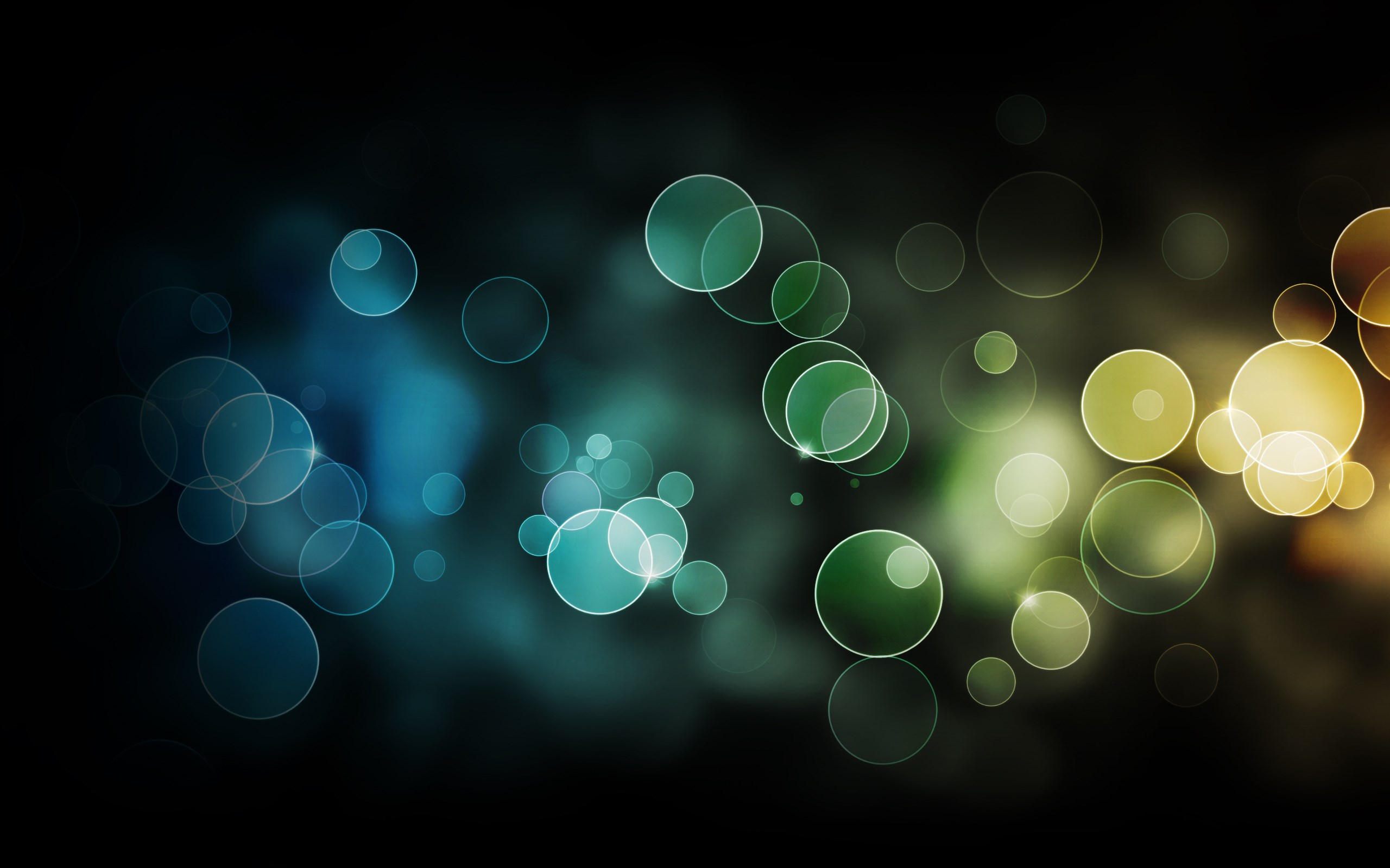 Abstract bokeh lights in blue, green, and yellow HD Wallpaper