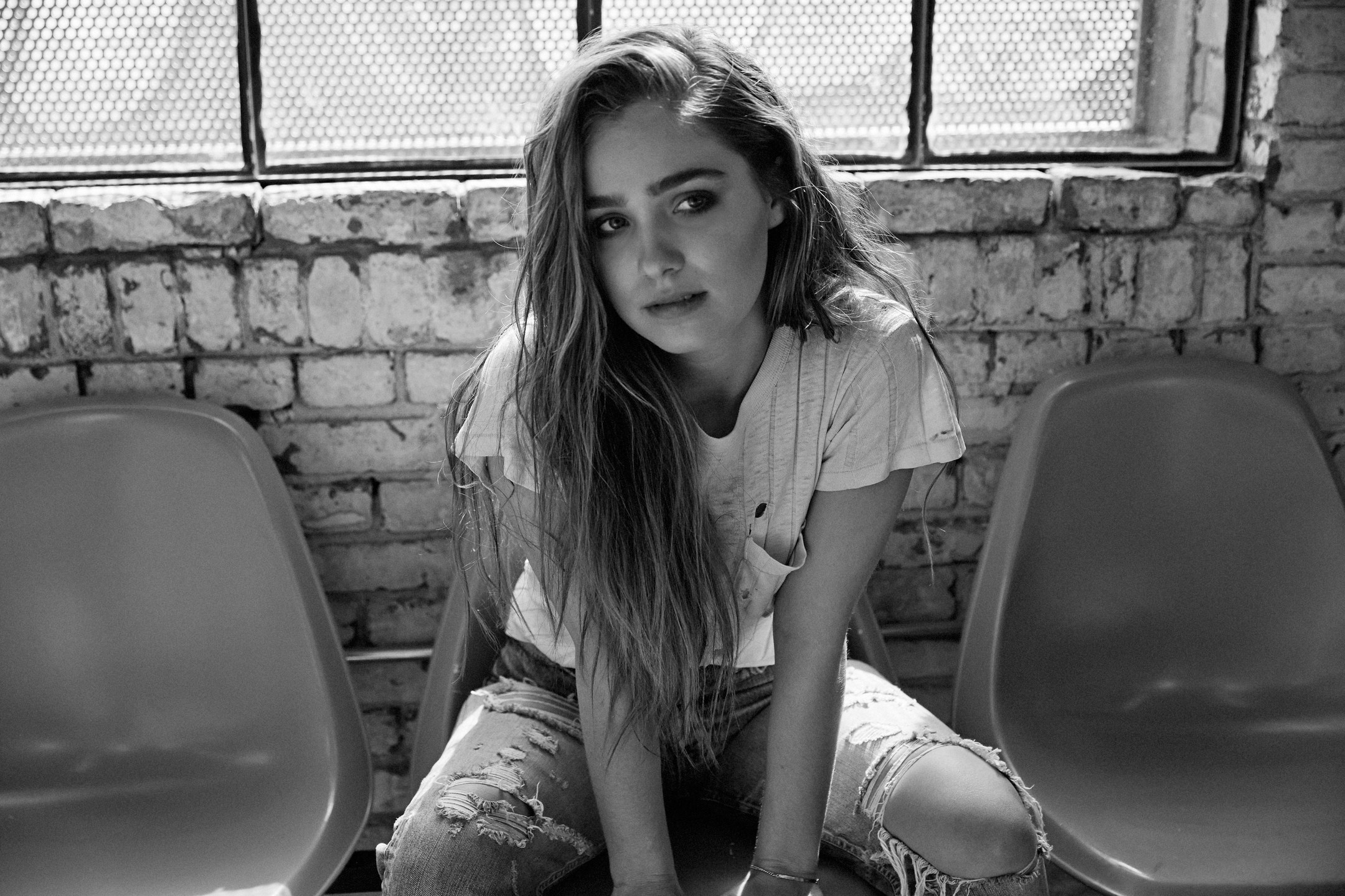 Haley Lu Richardson sitting in chairs HD Wallpaper