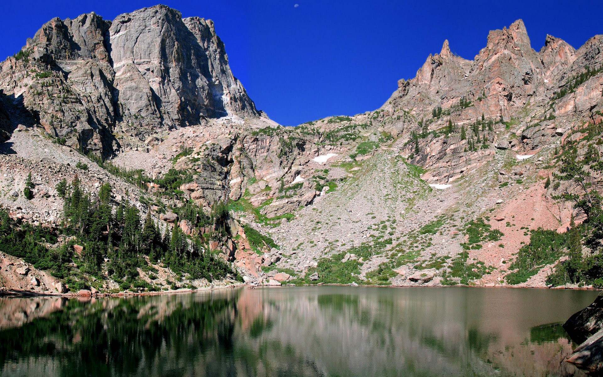 Lake and Rocky Mountains under a clear blue sky HD Wallpaper