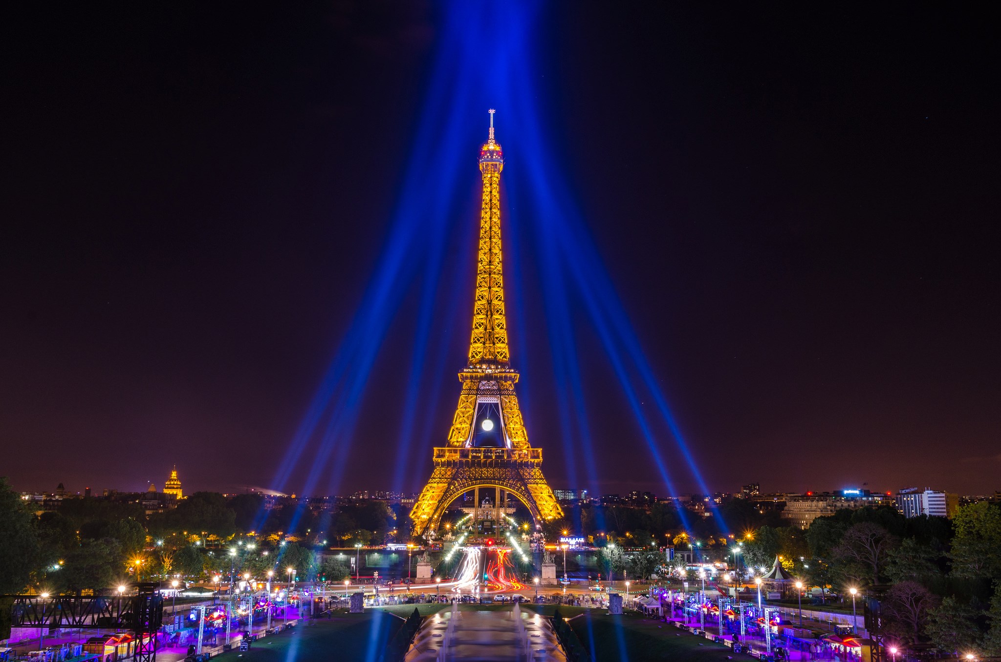 Eiffel Tower illuminated with blue lights at night HD Wallpaper