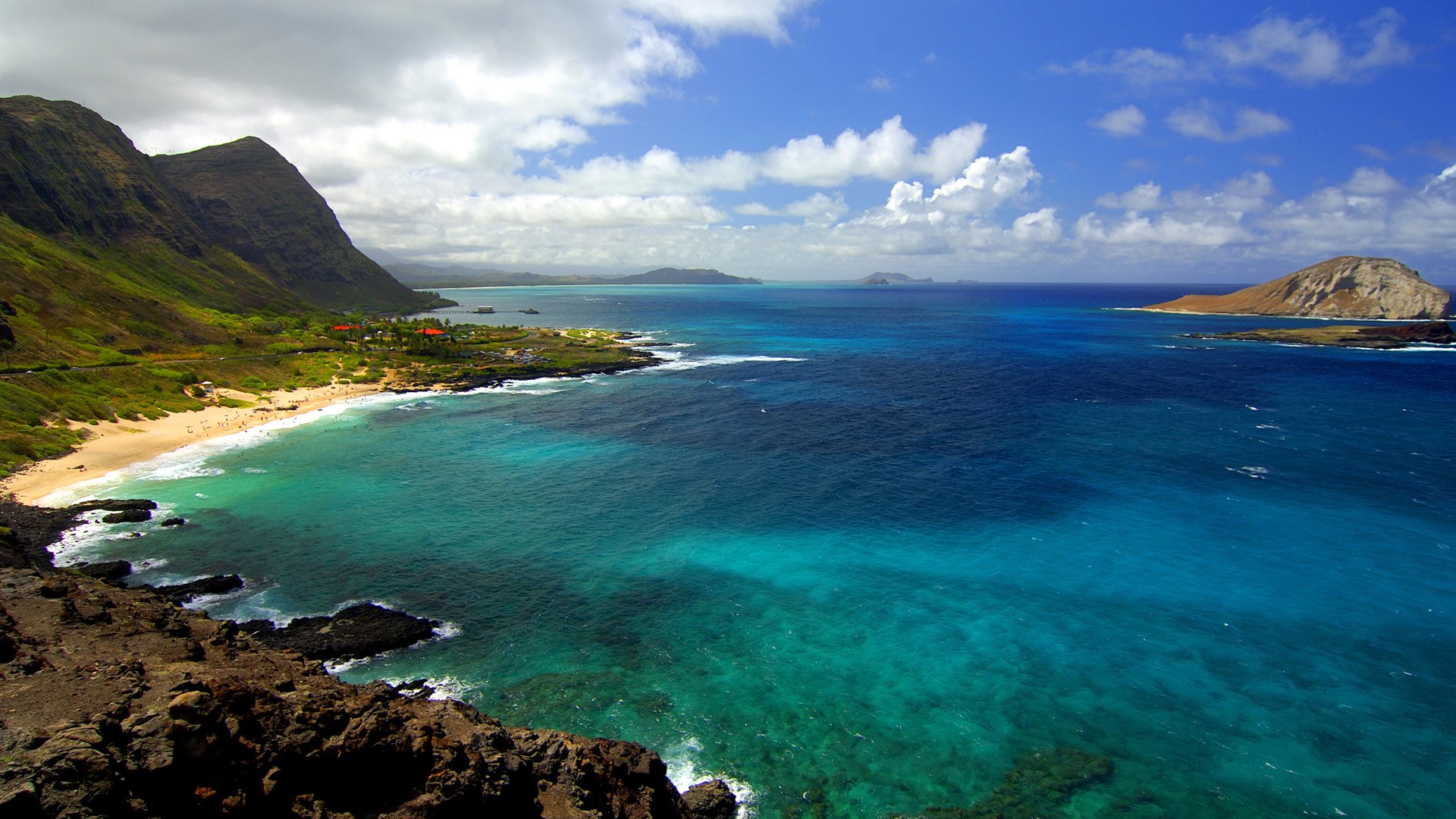 Ocean landscape with mountains and island HD Wallpaper