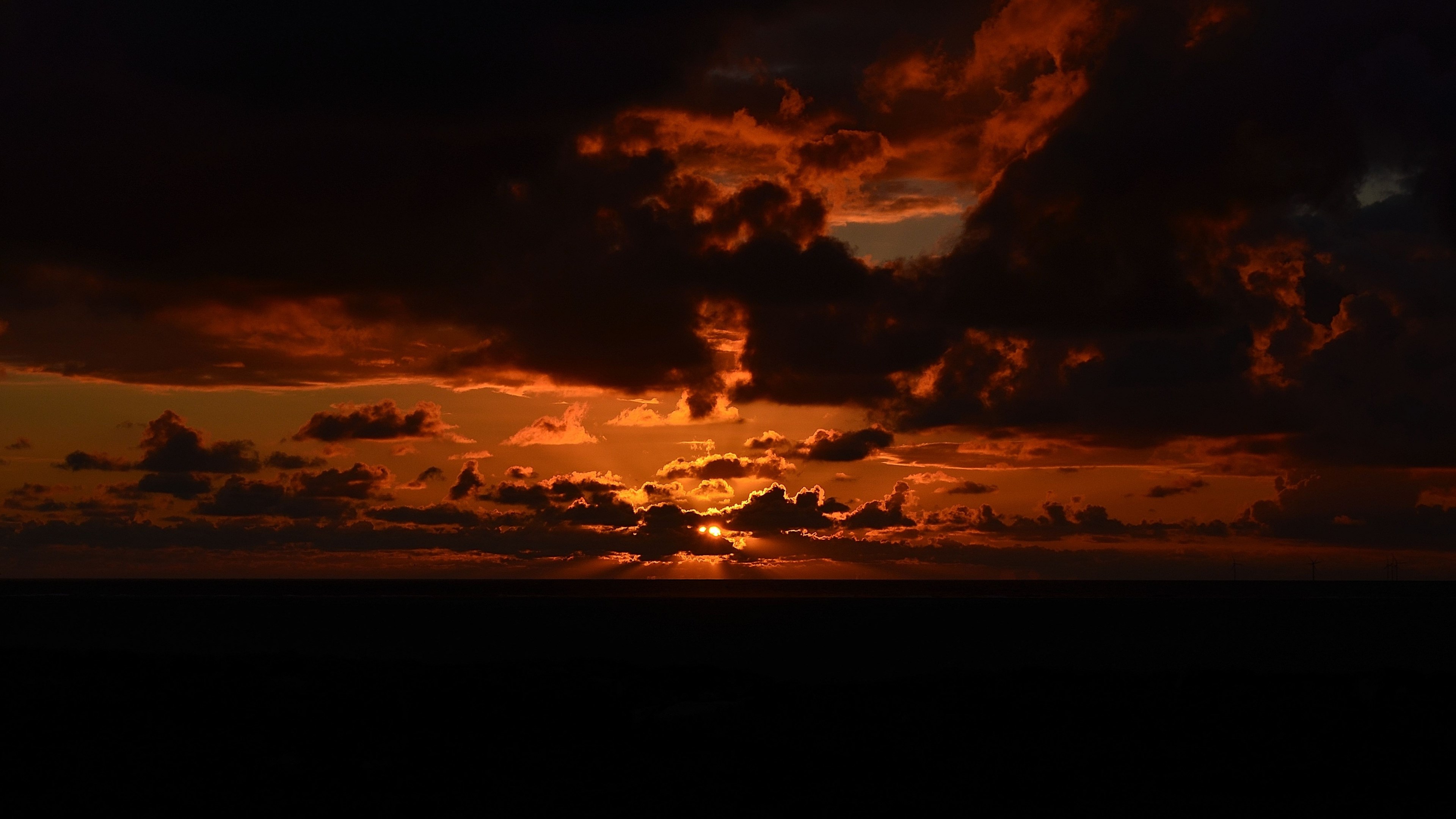 4K Sunset Over the Ocean with Clouds HD Wallpaper