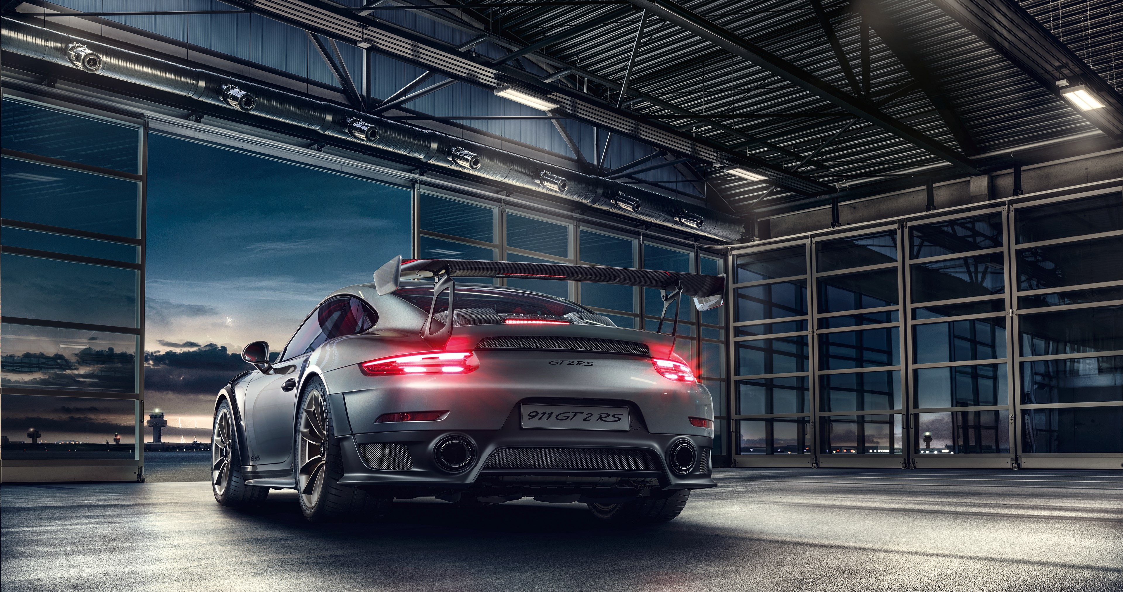 Porsche 911 GT2 RS in hangar HD Wallpaper
