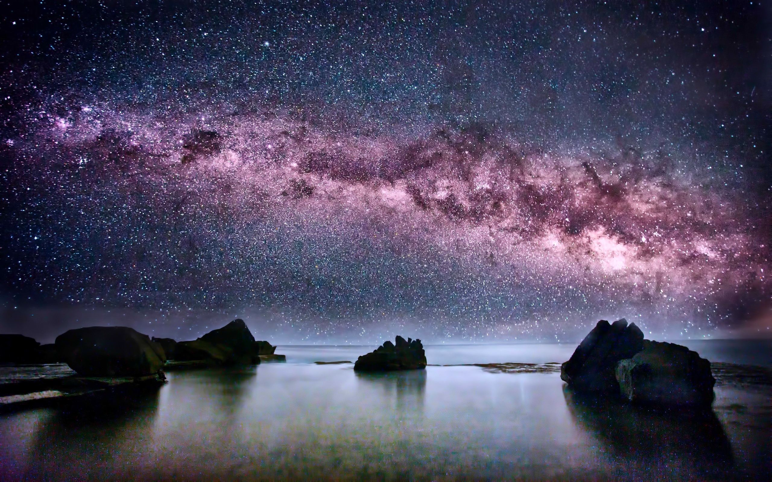 Milky Way galaxy over ocean rocks HD Wallpaper