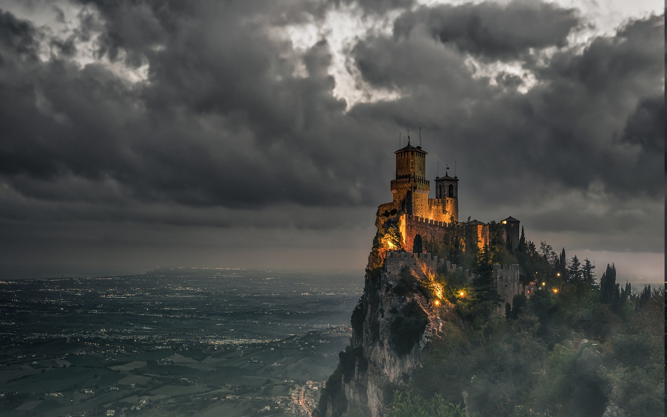 San Marino Castle on Foggy Hilltop at Dusk HD Wallpaper