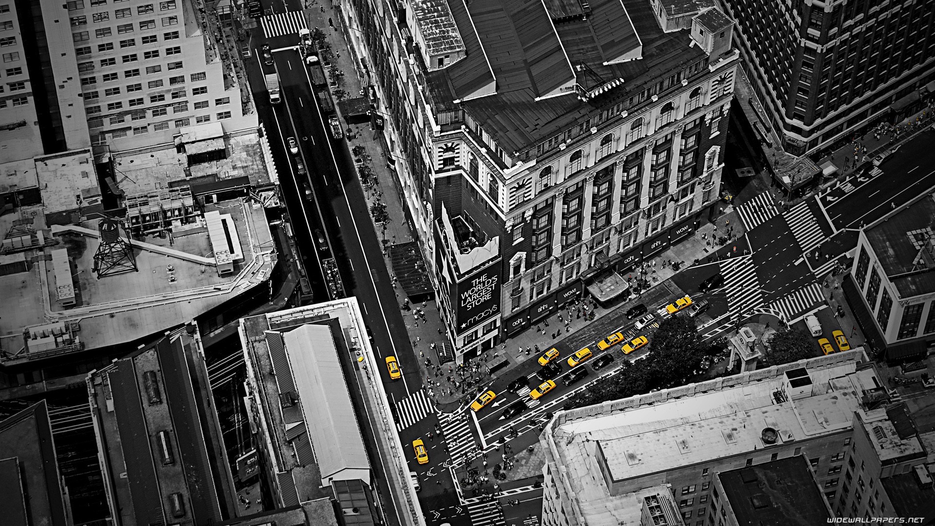 Aerial view of New York City street with yellow taxis HD Wallpaper
