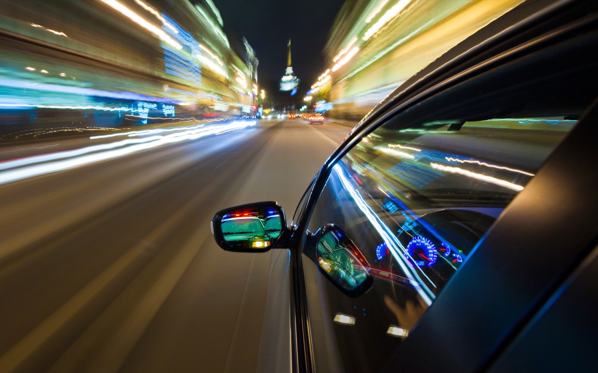 Car driving at night with motion blur and light trails HD Wallpaper