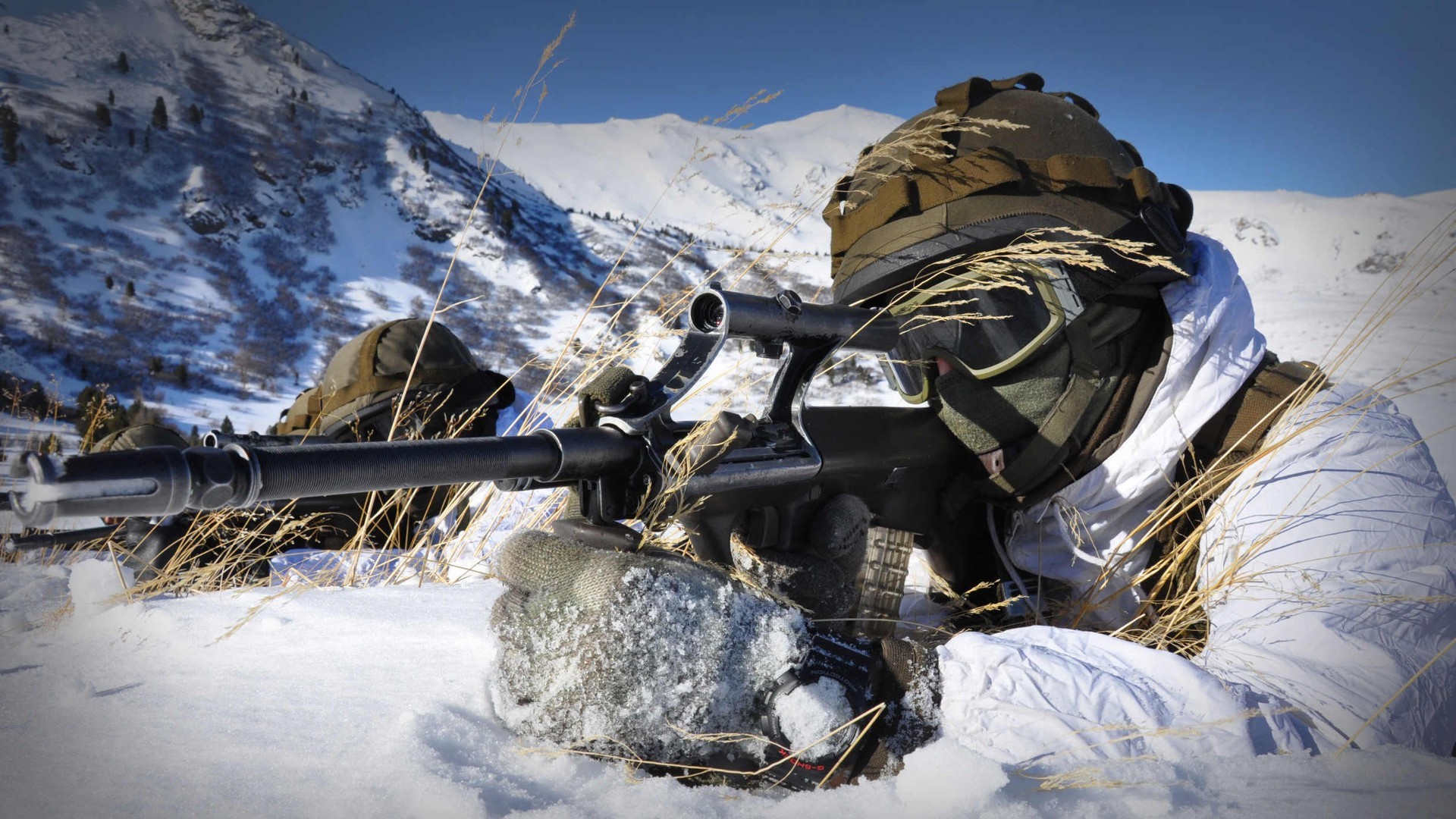 Soldiers in snow with rifles in mountains HD Wallpaper