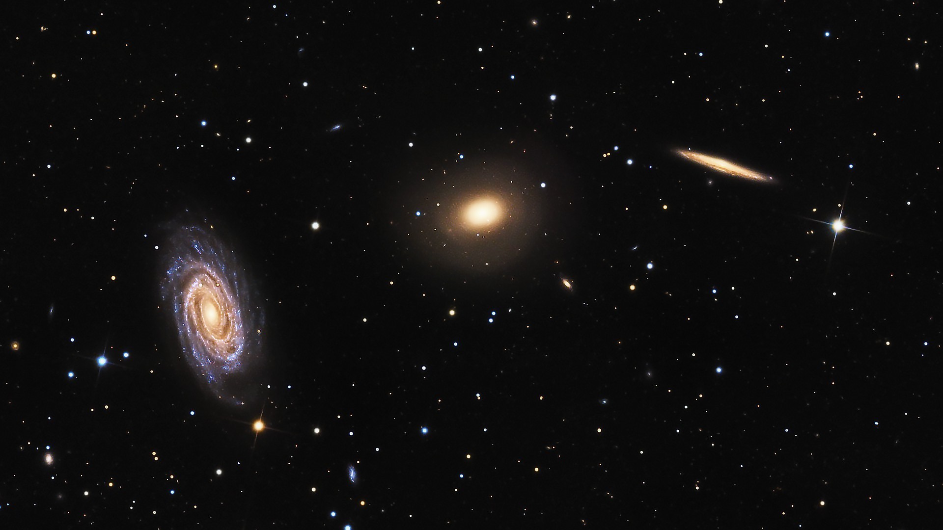 Three Distinct Galaxies Against Starry Universe HD Wallpaper