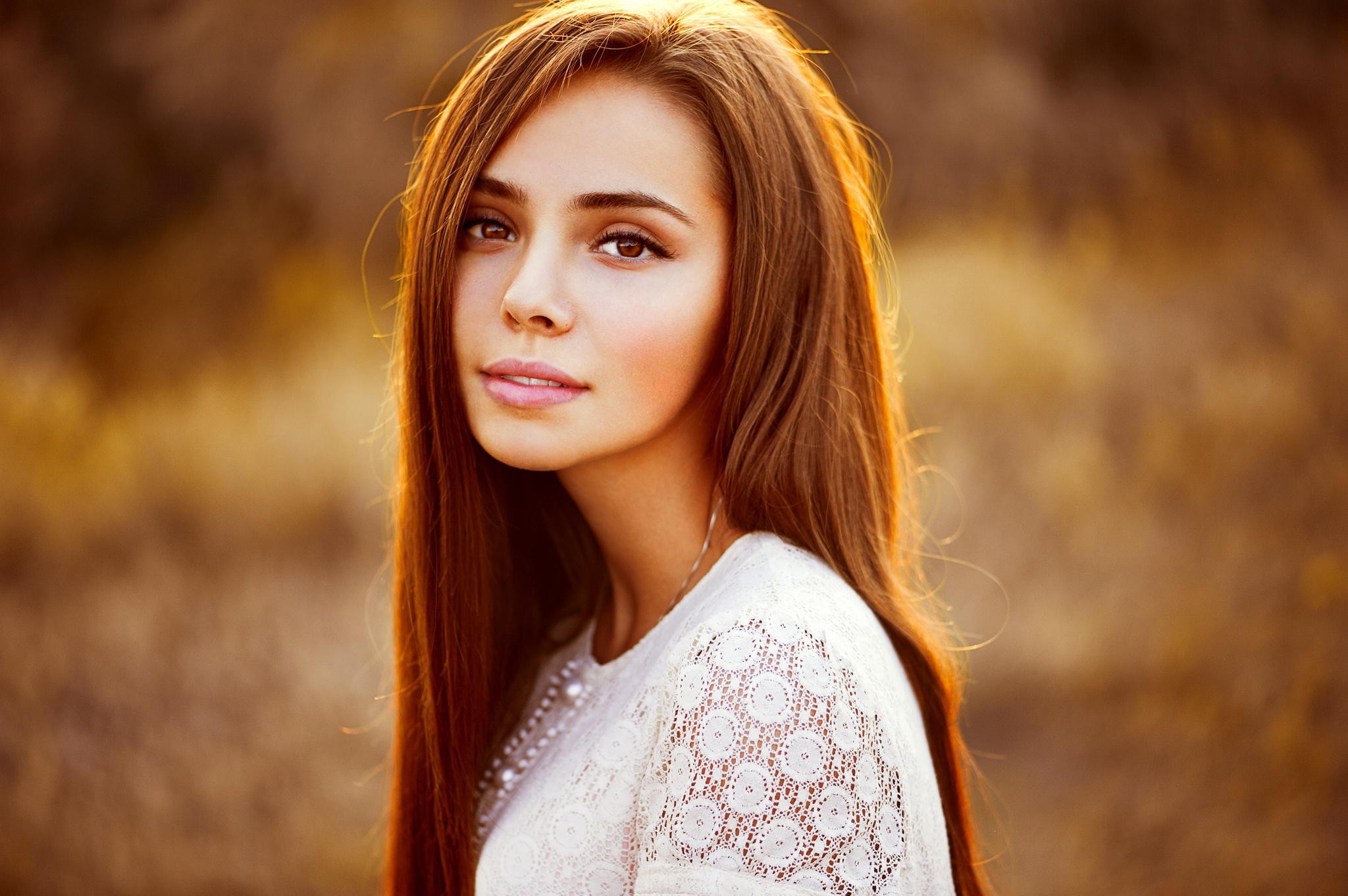 Woman with long brown hair and white top HD Wallpaper