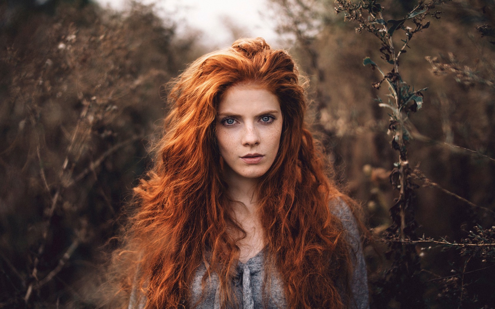 Woman with long red hair outdoors HD Wallpaper